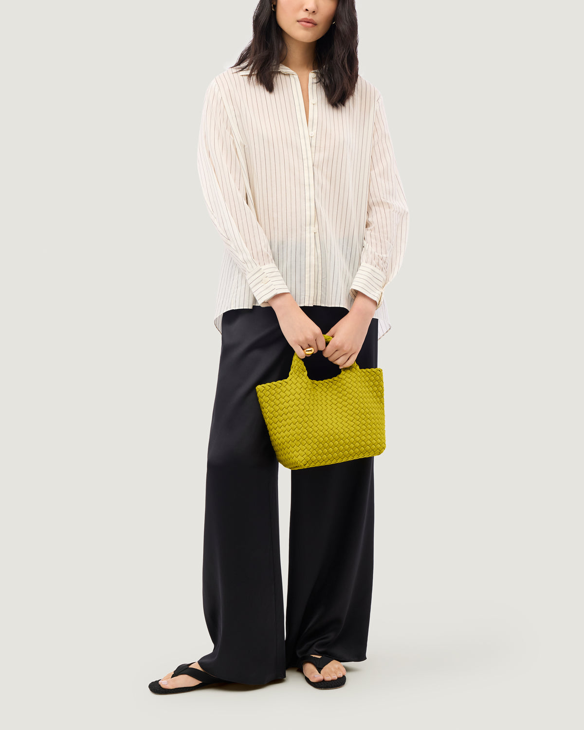 St. Barths Tote in Ochre shown on model to illustrate scale and soft silhouette.