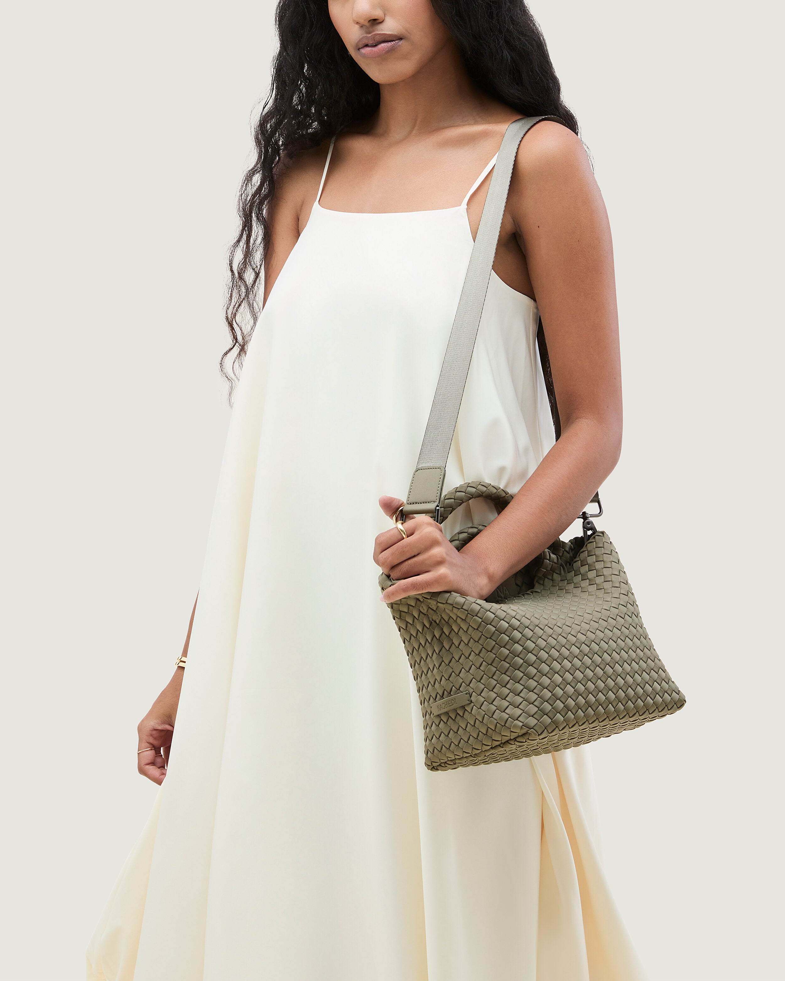 St. Barths Tote in Olea shown on model to illustrate scale and soft silhouette.