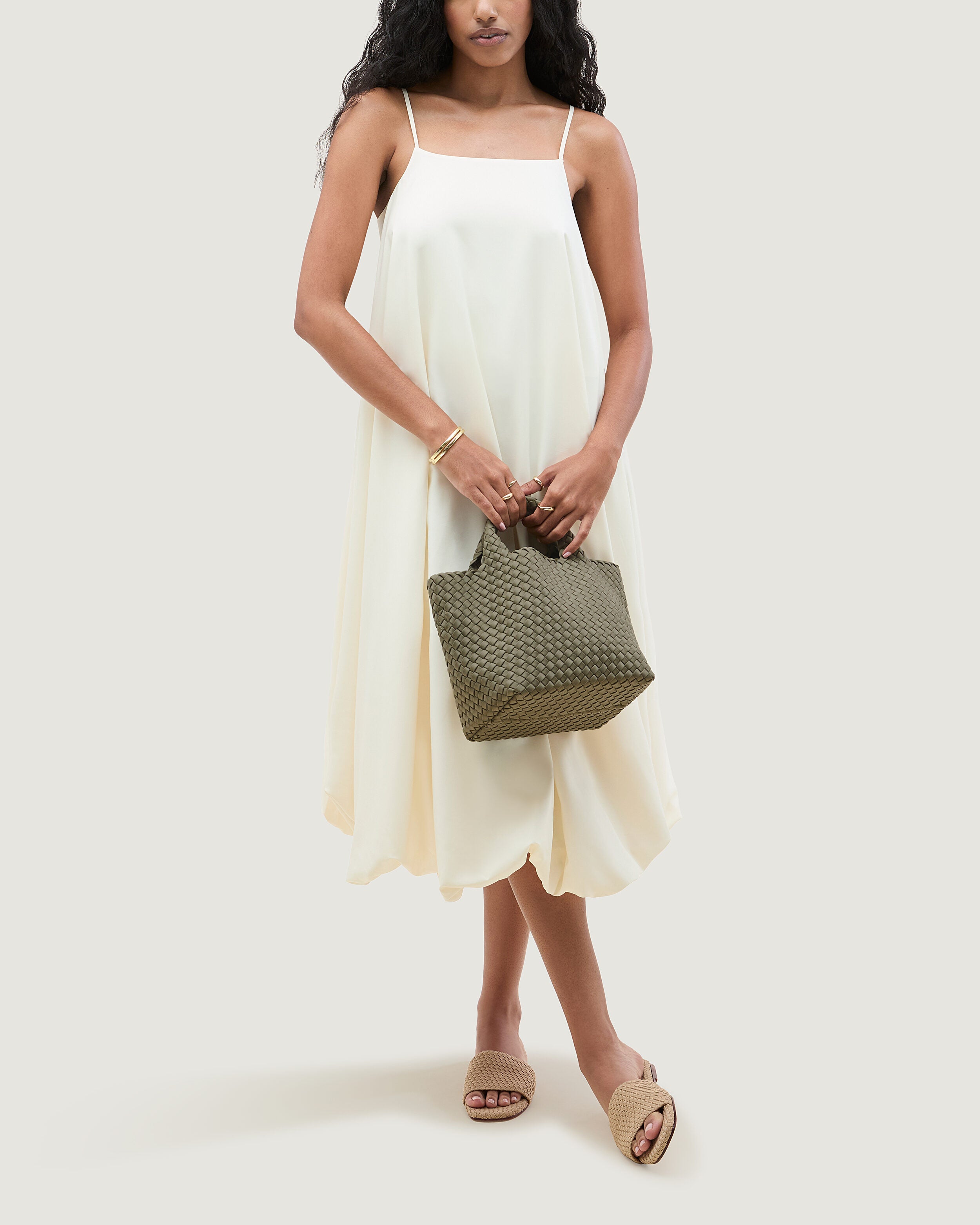 St. Barths Tote in Olea shown on model to illustrate scale and soft silhouette.