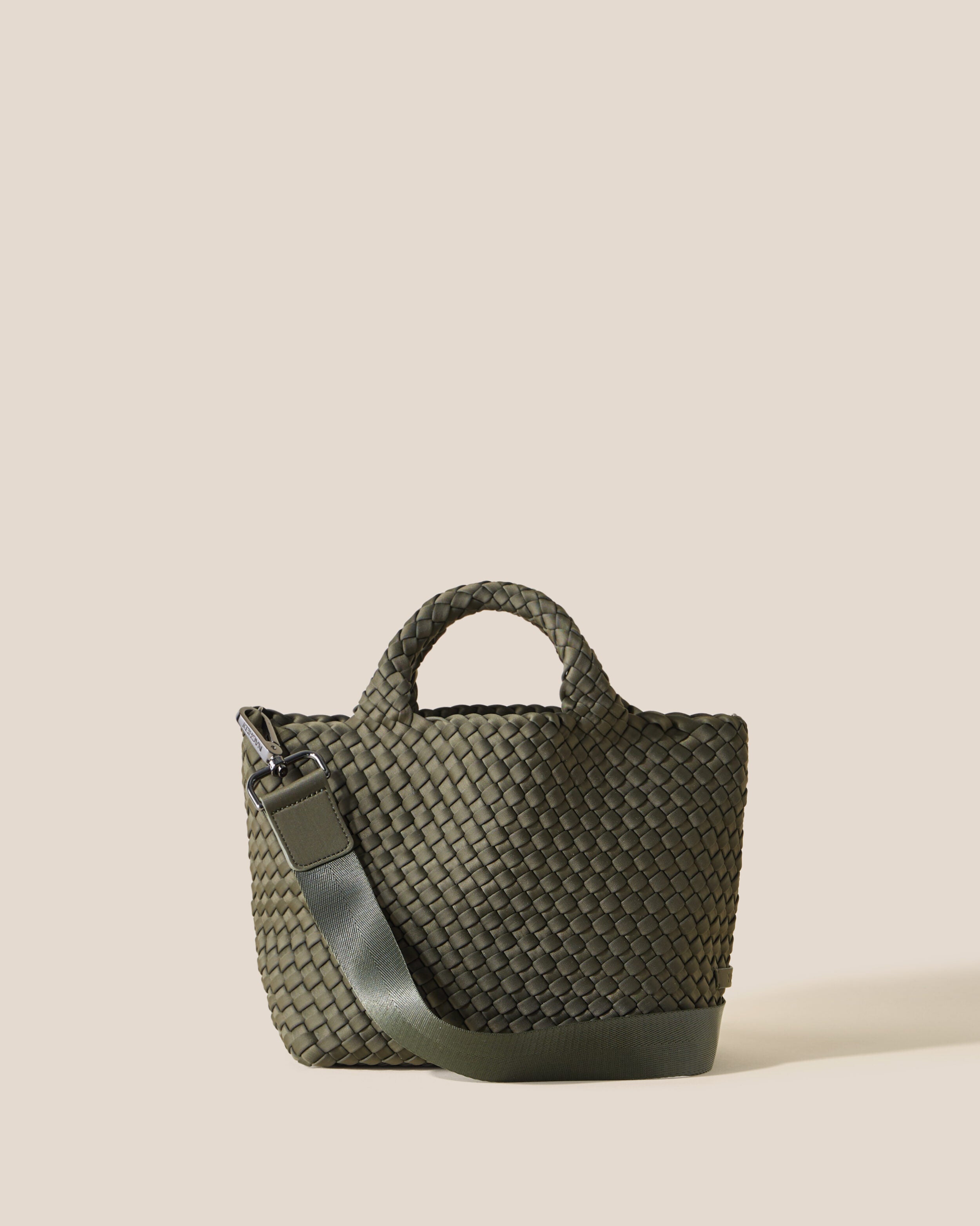 St. Barths Tote in Olive, an olive green tone, in handwoven neoprene, featuring an open top, woven top handles, and detachable, adjustable nylon crossbody strap.