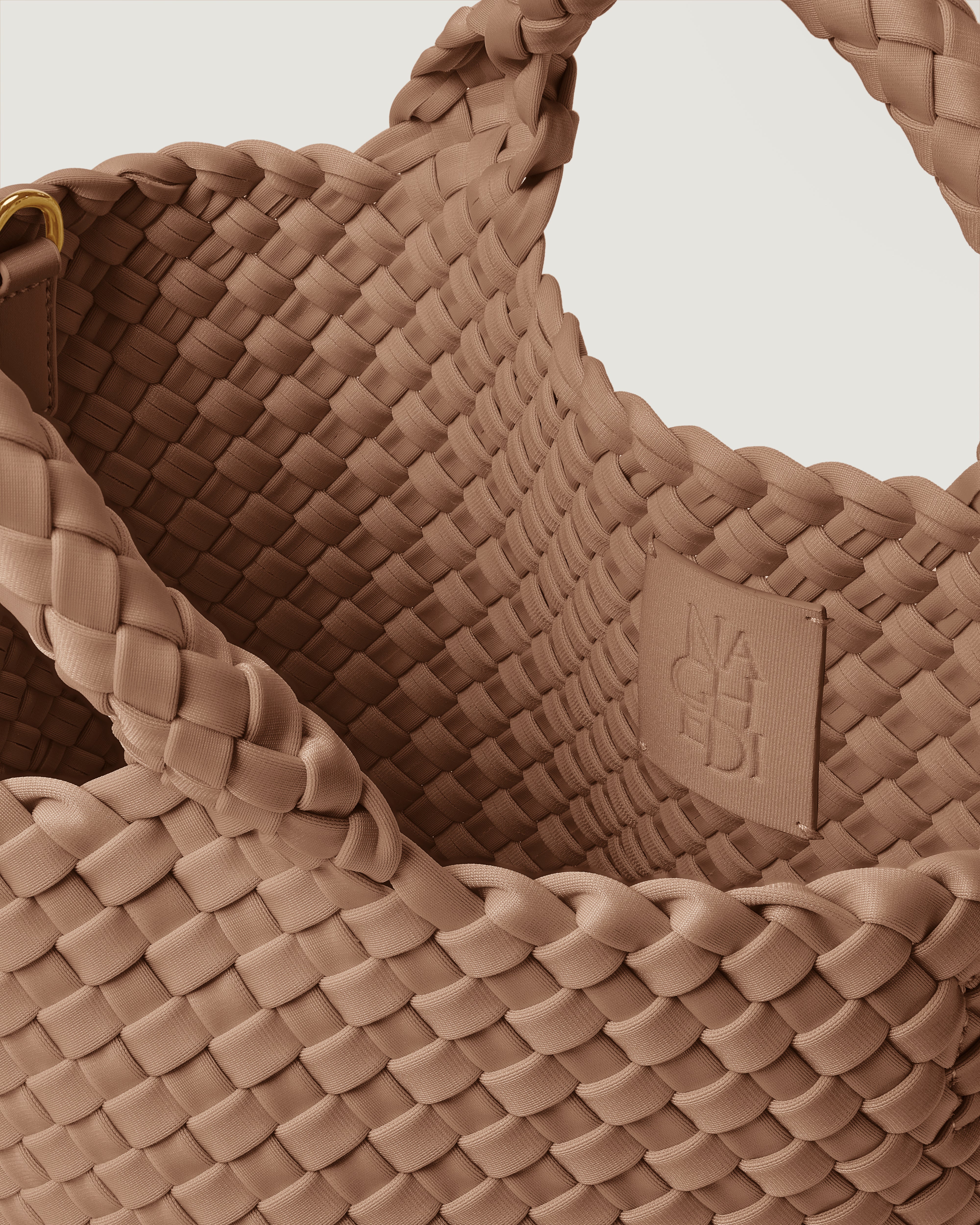 Interior close-up of St. Barths Tote in Seychelles showing its open top, and unlined interior.