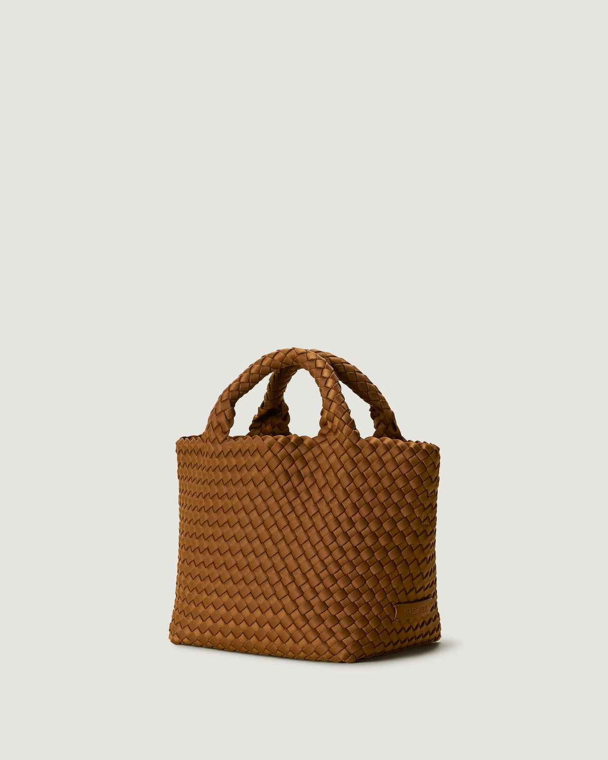 Side view of the St. Barths Small Tote in a saddle brown color