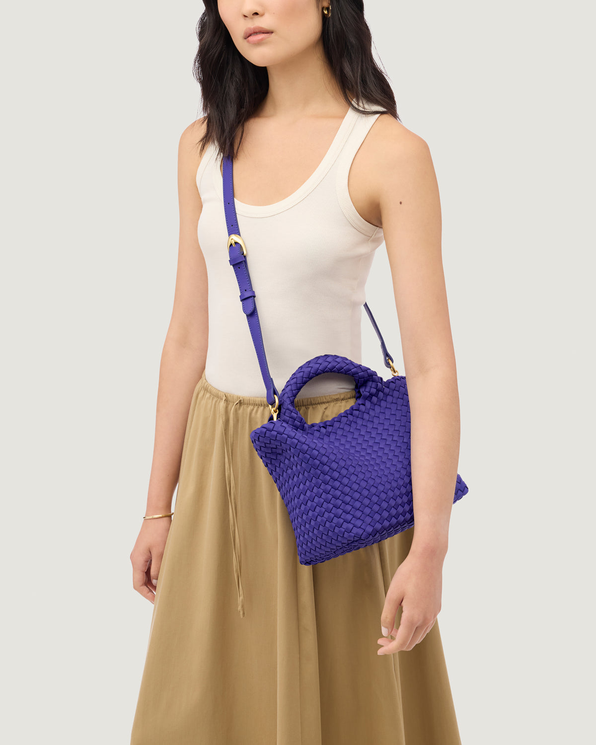 St. Barths Tote in Ultramarine shown on model to illustrate scale and soft silhouette.