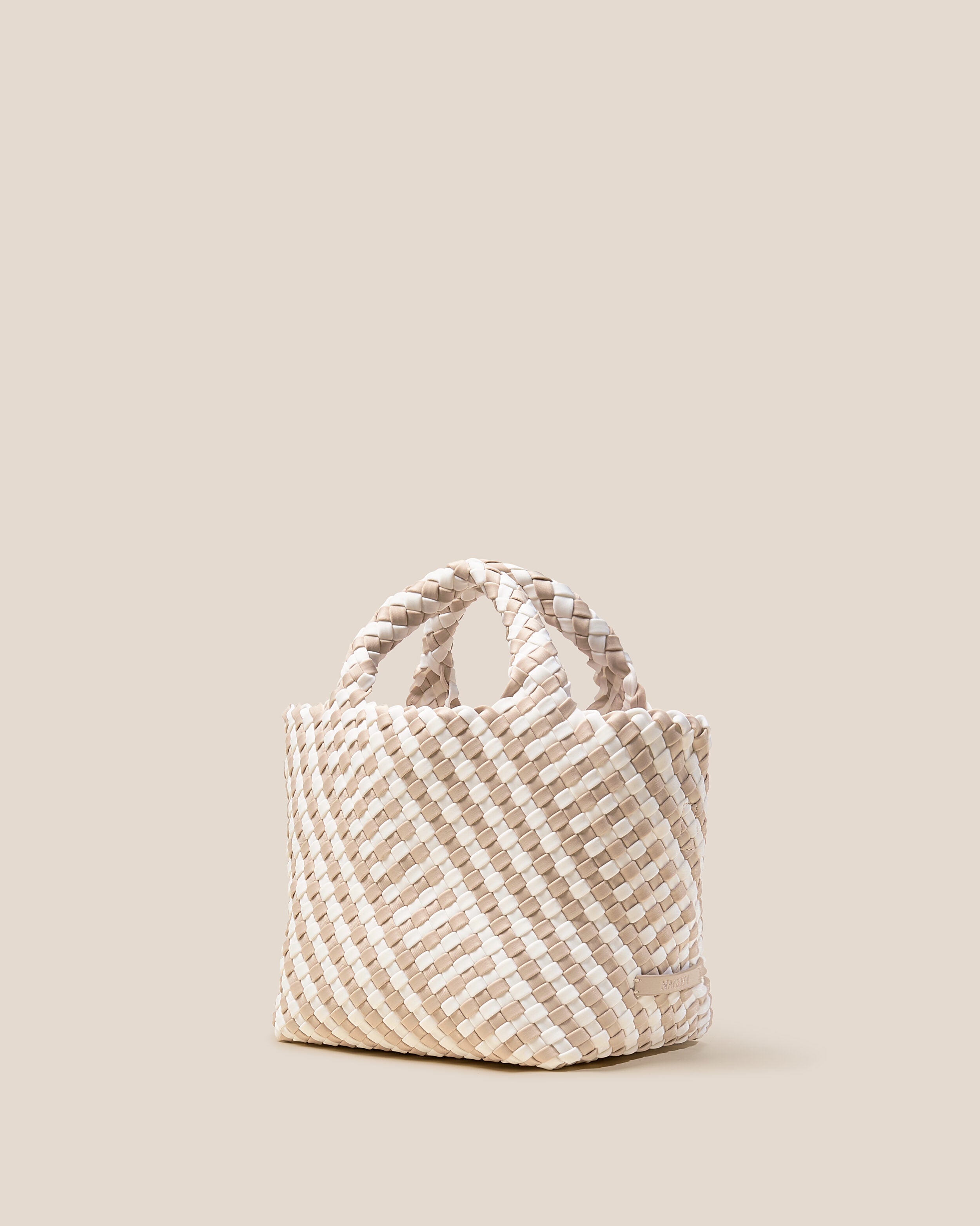 St. Barths Tote in Mykonos shown from a side angle, highlighting its handwoven neoprene construction and open top.