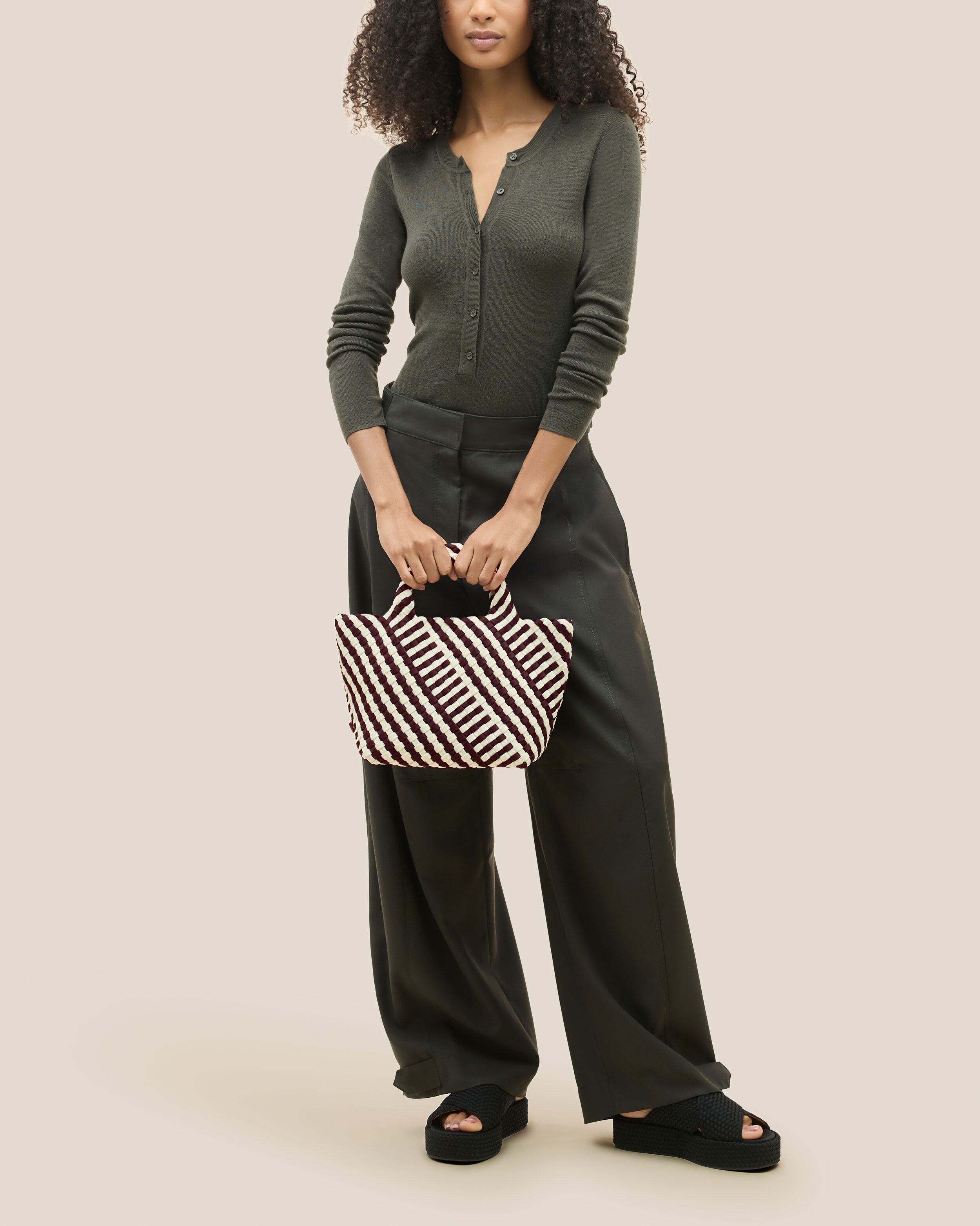 St. Barths Tote in Roma shown on model to illustrate scale and soft silhouette.