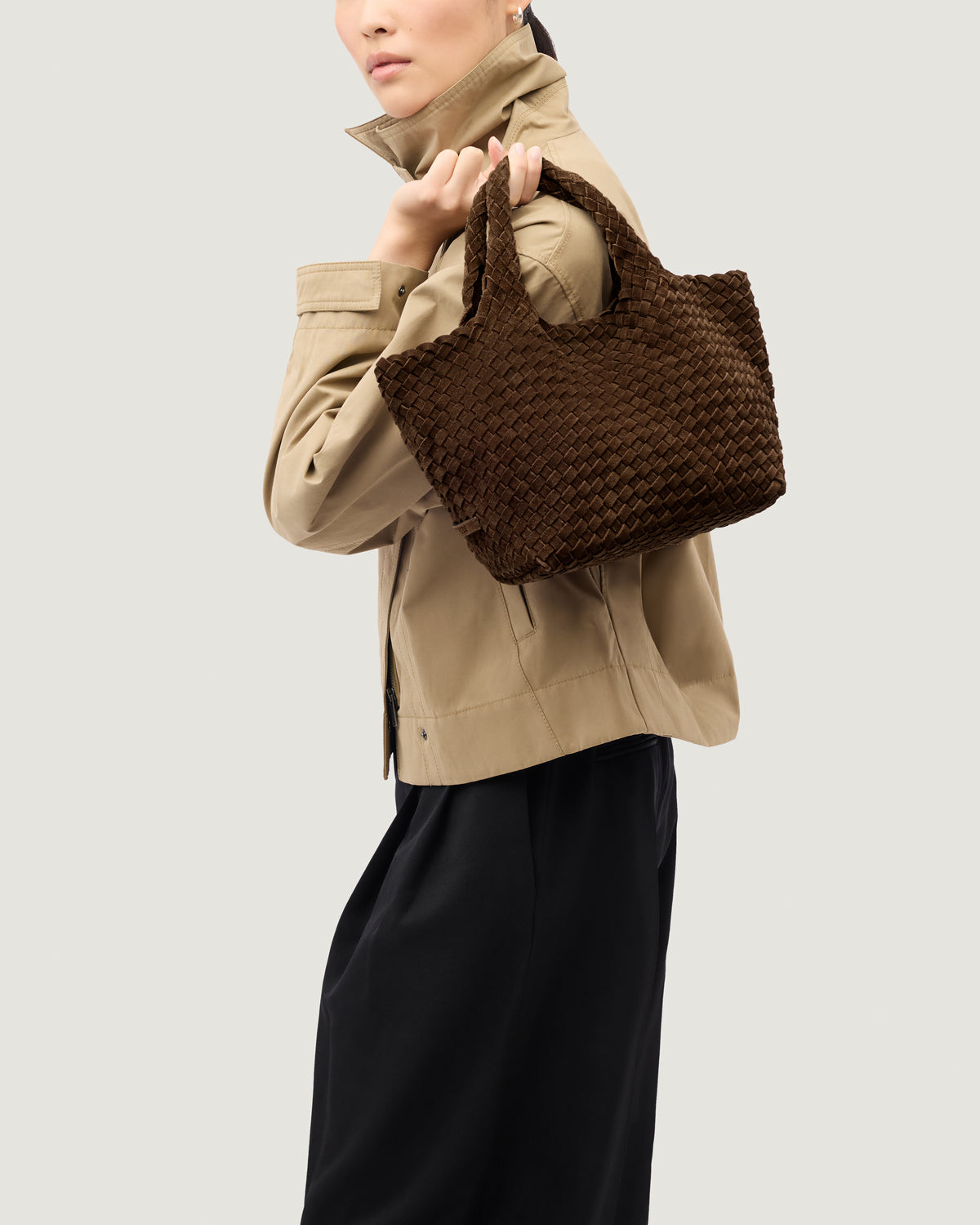 St. Barths Tote in Teak shown on model to illustrate scale and soft silhouette.