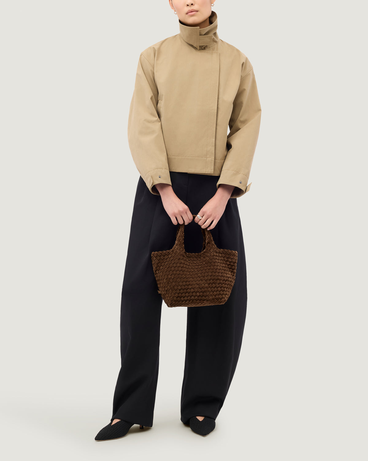 St. Barths Tote in Teak shown on model to illustrate scale and soft silhouette.
