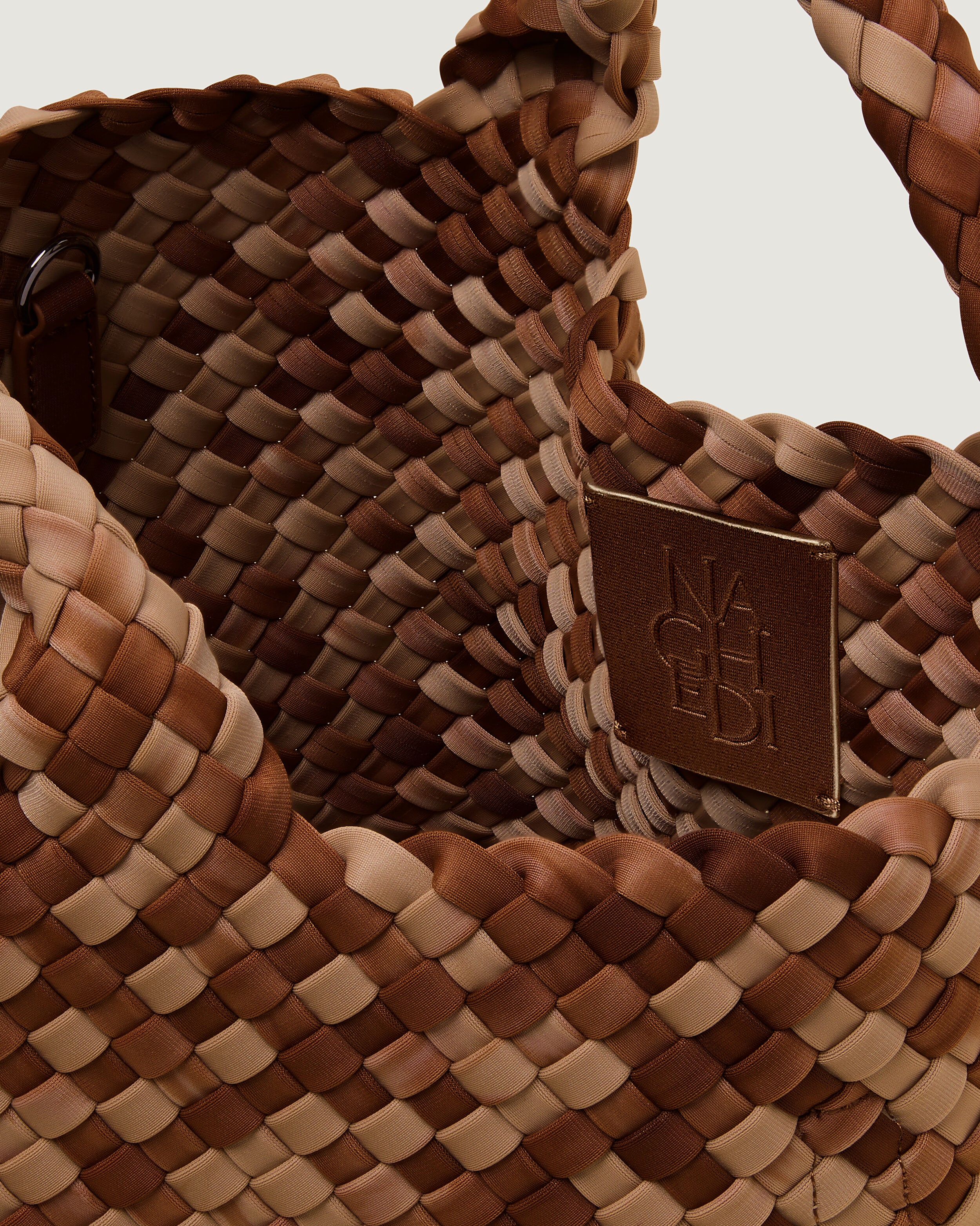 Interior close-up of St. Barths Tote in Fez showing its open top, and unlined interior.