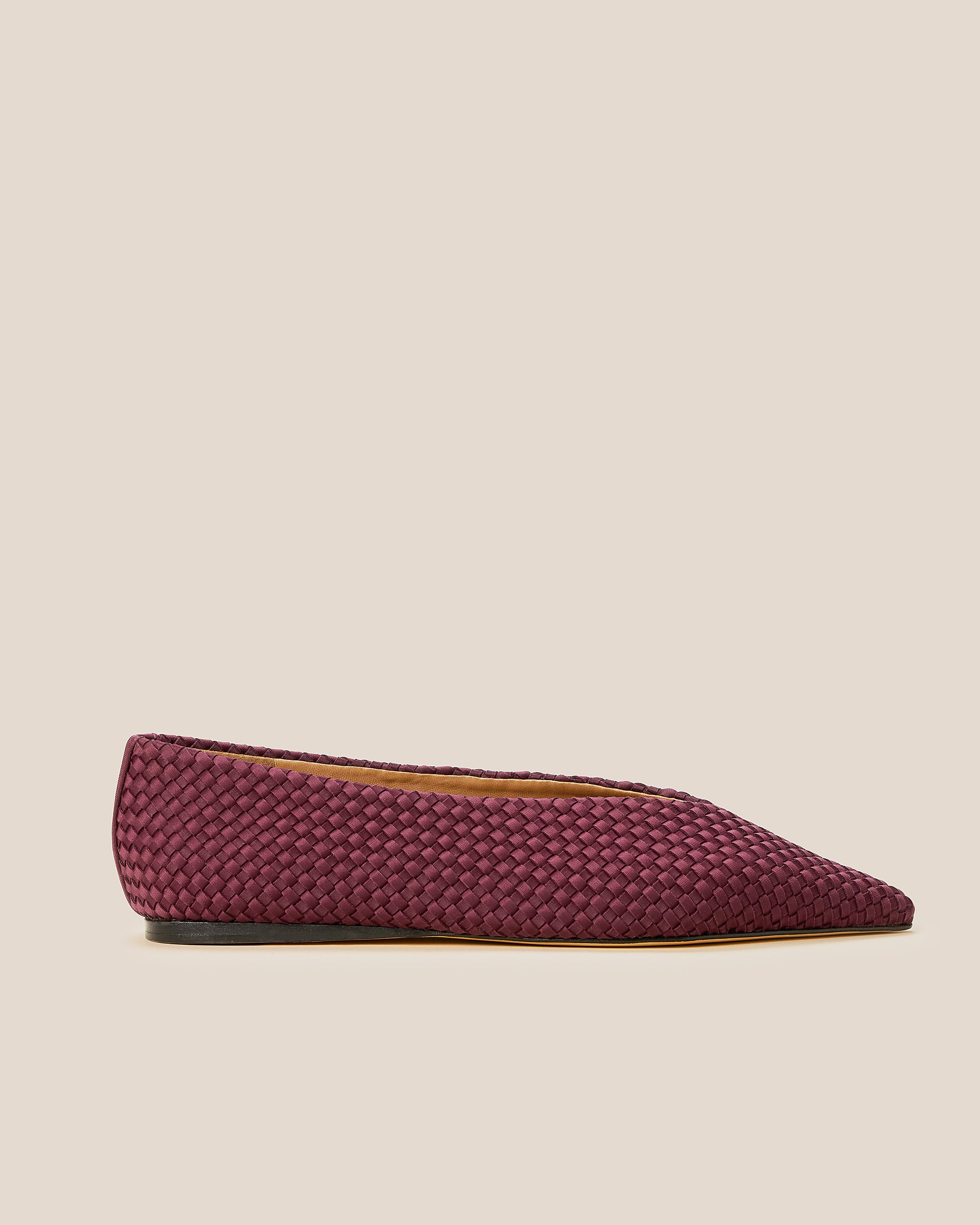 Side view of Strada Flats in Bordeaux, a rich burgundy tone, featuring a closed toe and pointed silhouette.