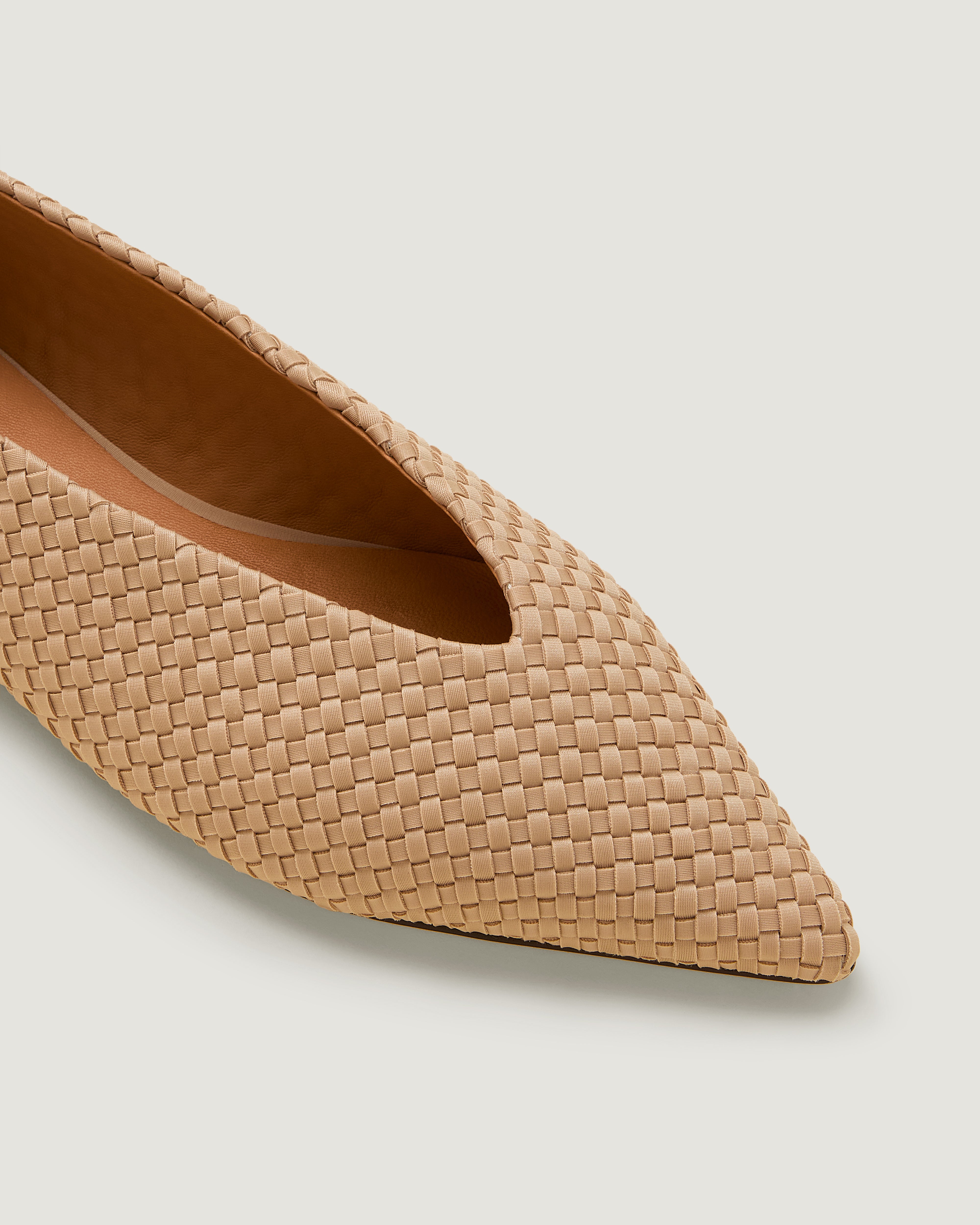 Close-up of Strada  in Camel showing its closed toe and pointed silhouette.