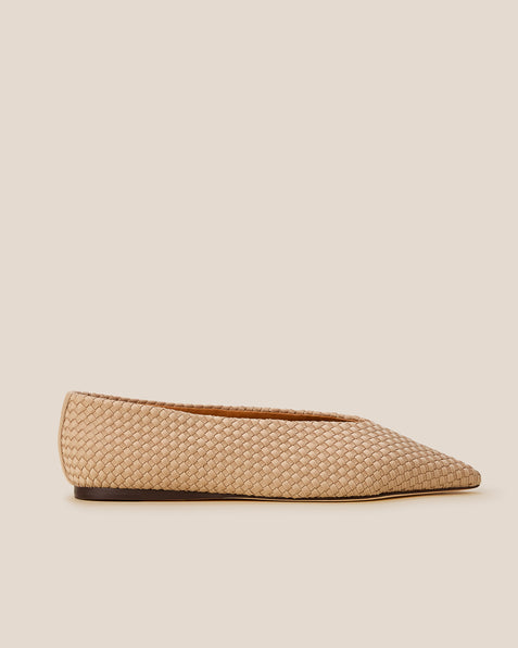 Side view of Strada Flats in Camel, a camel brown tone, featuring a closed toe and pointed silhouette.