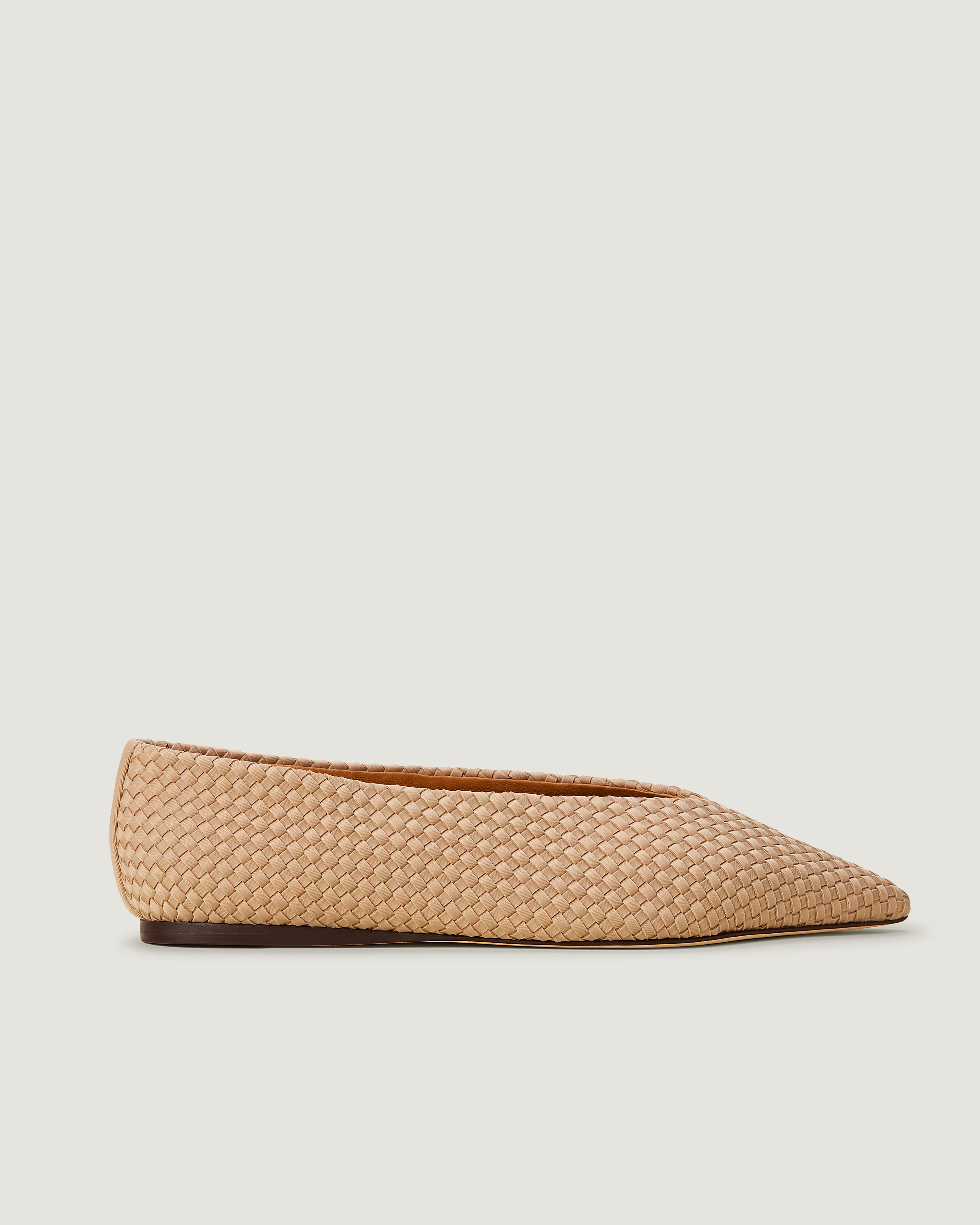 Side view of Strada  in Camel, a camel brown tone, featuring a closed toe and pointed silhouette.
