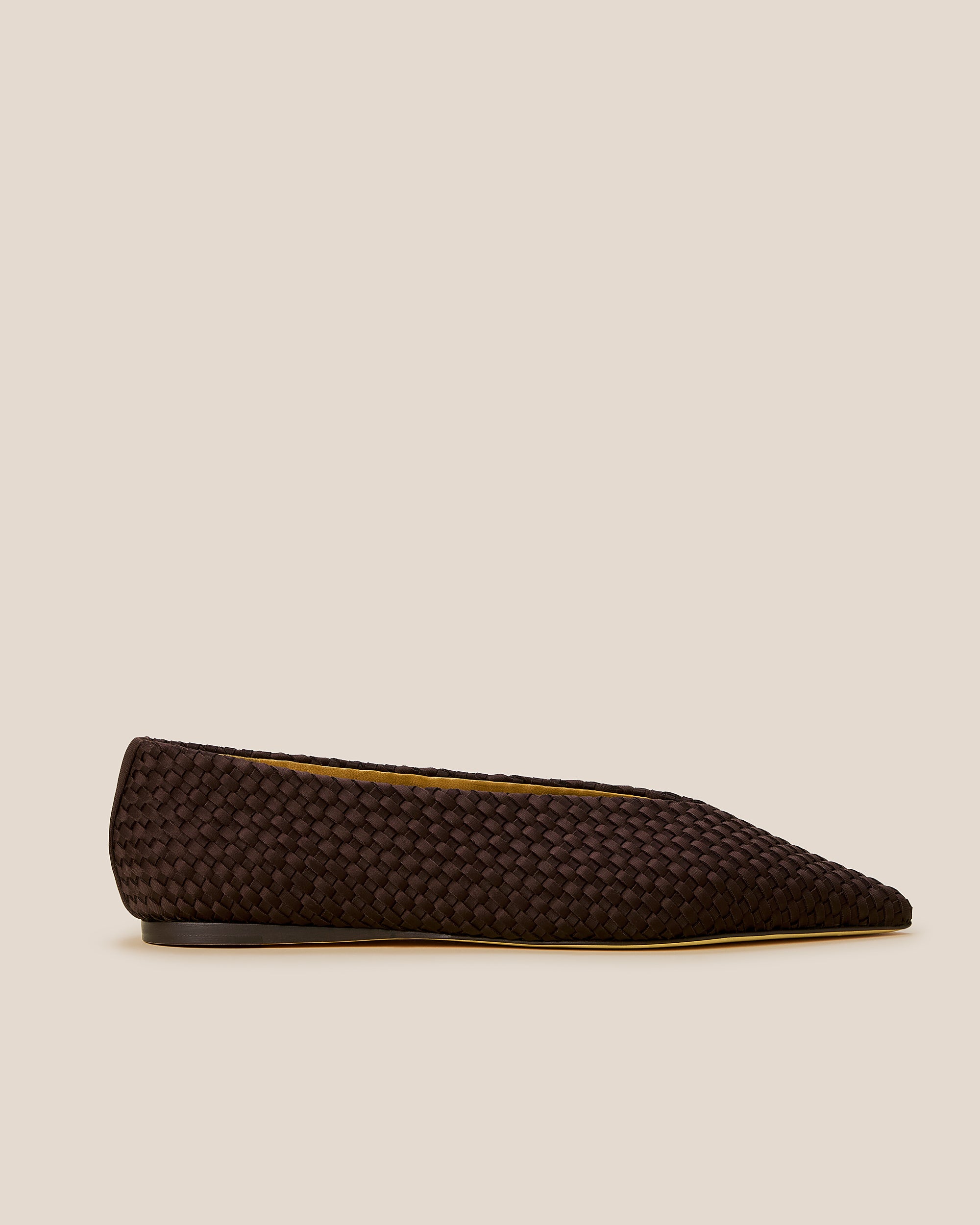 Side view of Strada Flats in Chocolate, a dark chocolate brown tone, featuring a closed toe and pointed silhouette.