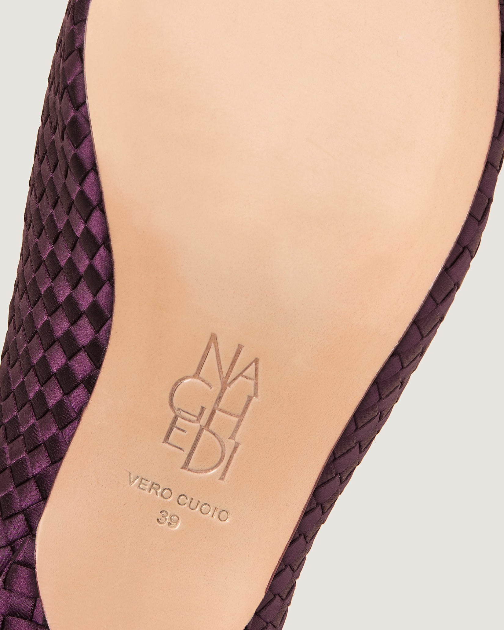 Shoe sole showing stamped NAGHEDI logo and size detail for Strada Satin Kitten Heel in Currant.