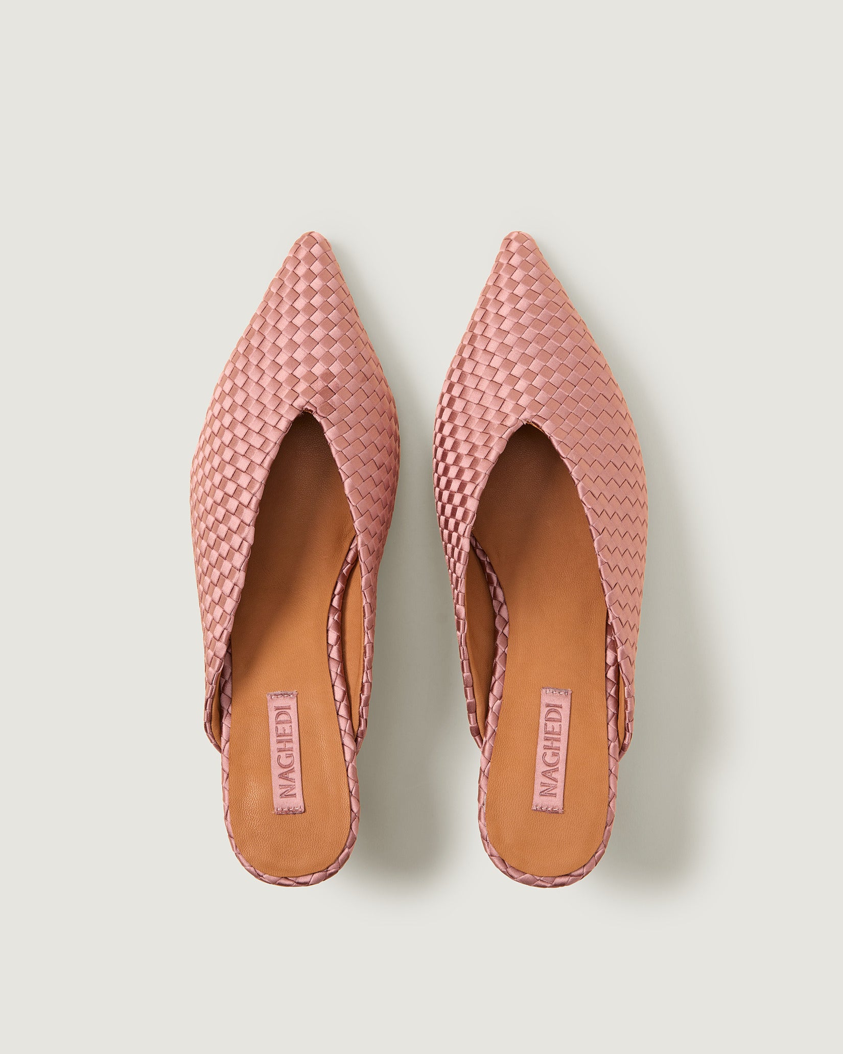 Top view of pair of Strada Satin Kitten Heel in Daphne showing the handwoven neoprene insole.