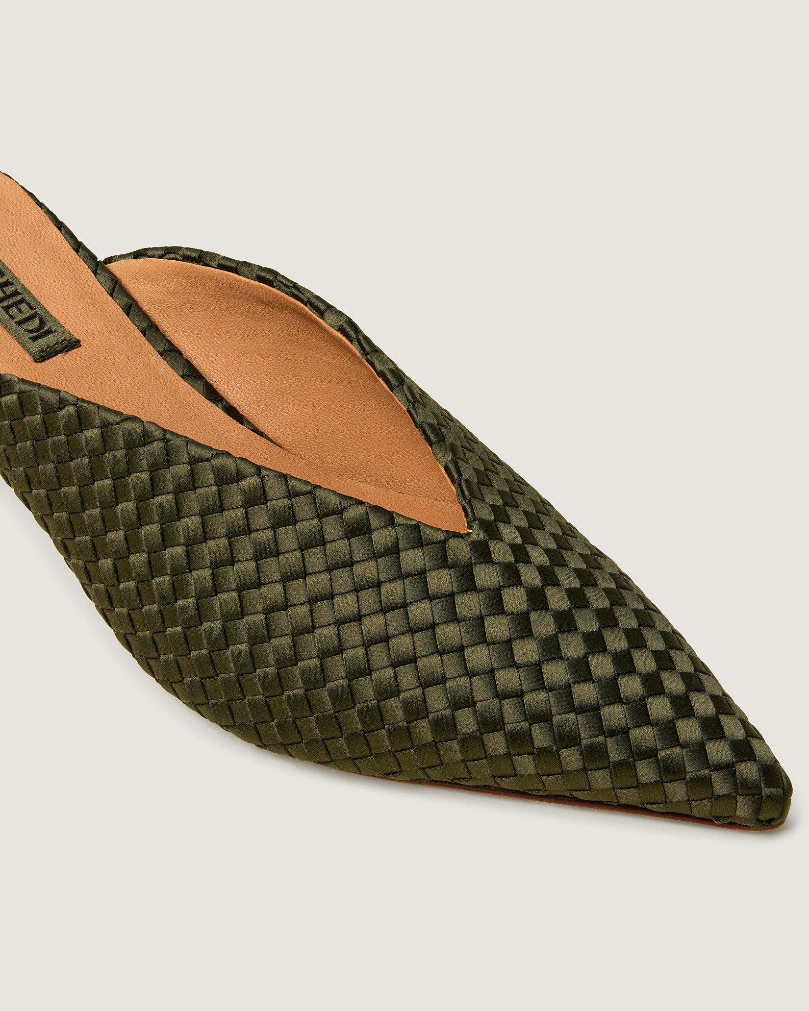 Close-up of Strada Satin Kitten Heel in Juniper showing its closed toe and pointed silhouette.