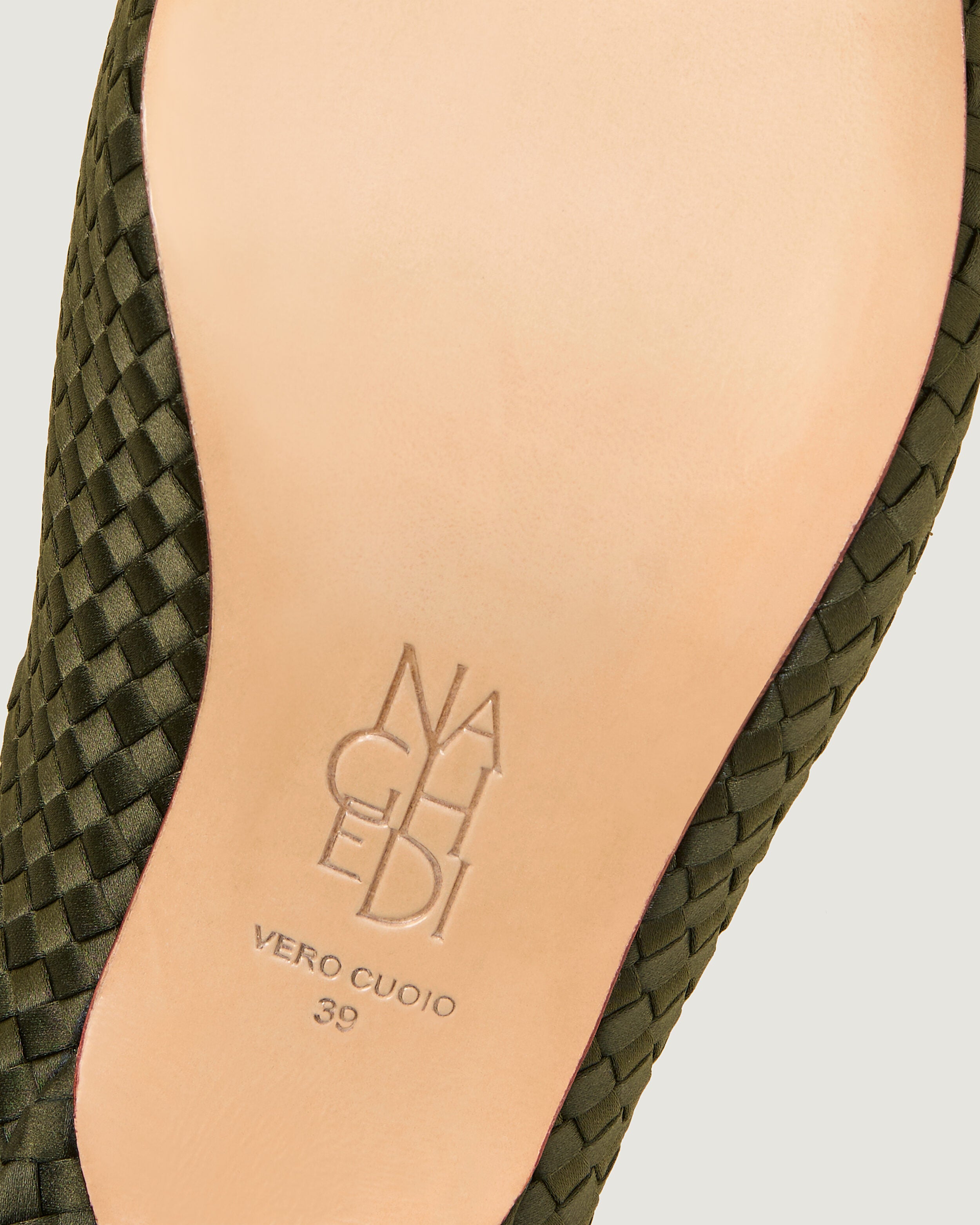 Shoe sole showing stamped NAGHEDI logo and size detail for Strada  in Juniper.