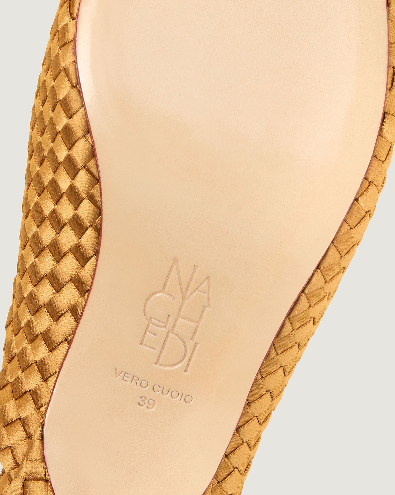 Shoe sole showing stamped NAGHEDI logo and size detail for Strada Satin Kitten Heel in Ore.