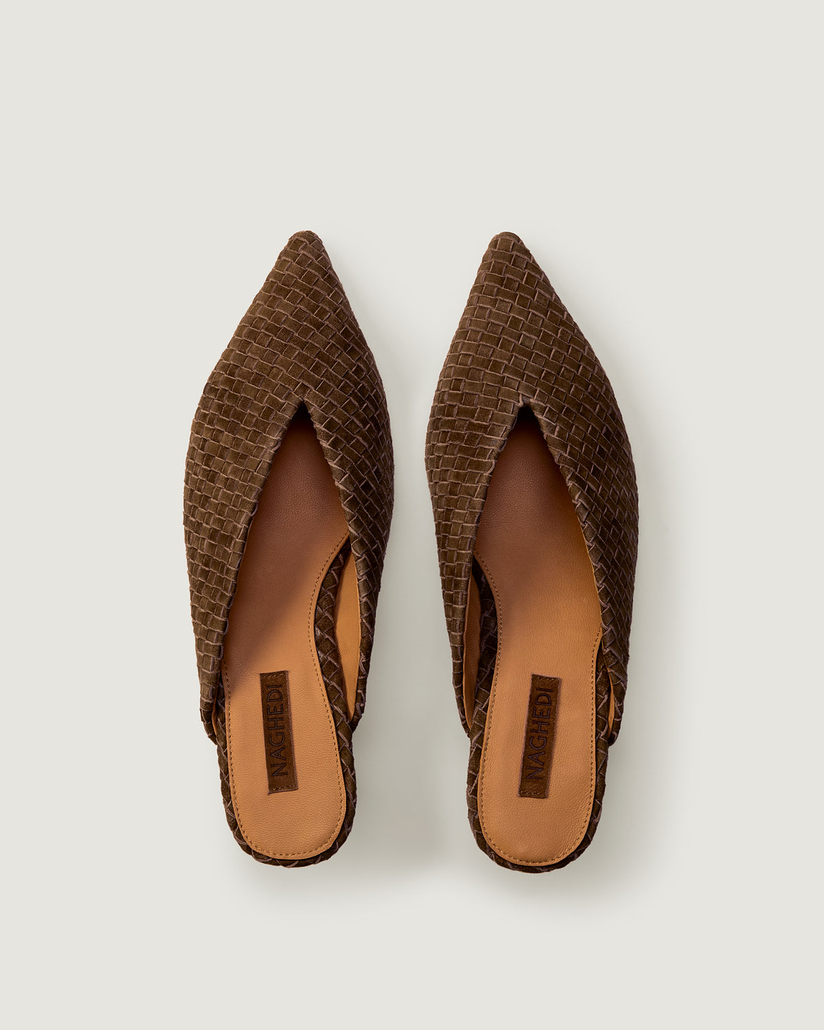Top view of pair of Strada in Teak showing the handwoven suede insole.