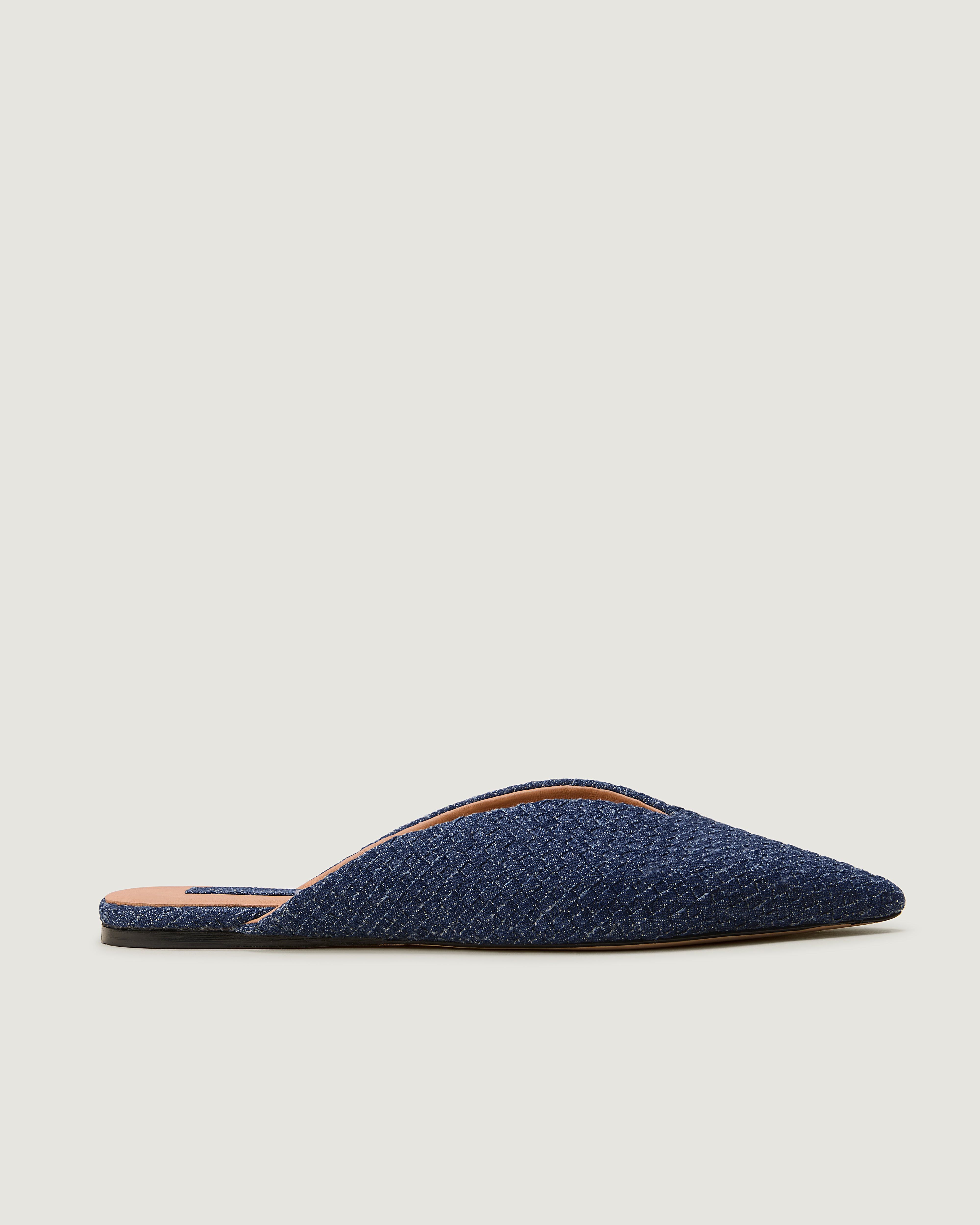 Side view of Strada Mule in Denim, featuring a closed toe and pointed silhouette.