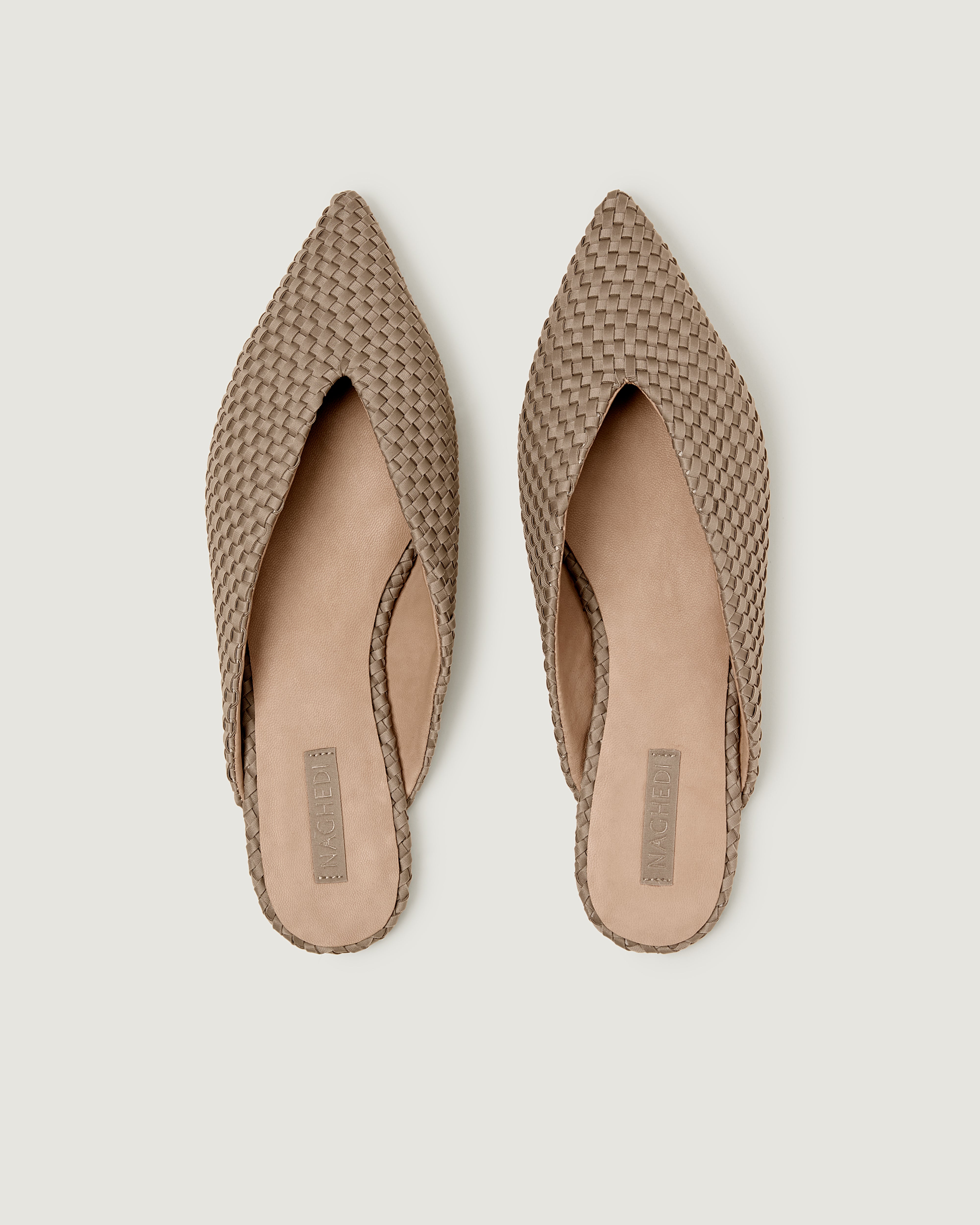 Top view of pair of Strada Mule in Cashmere showing the handwoven neoprene insole.