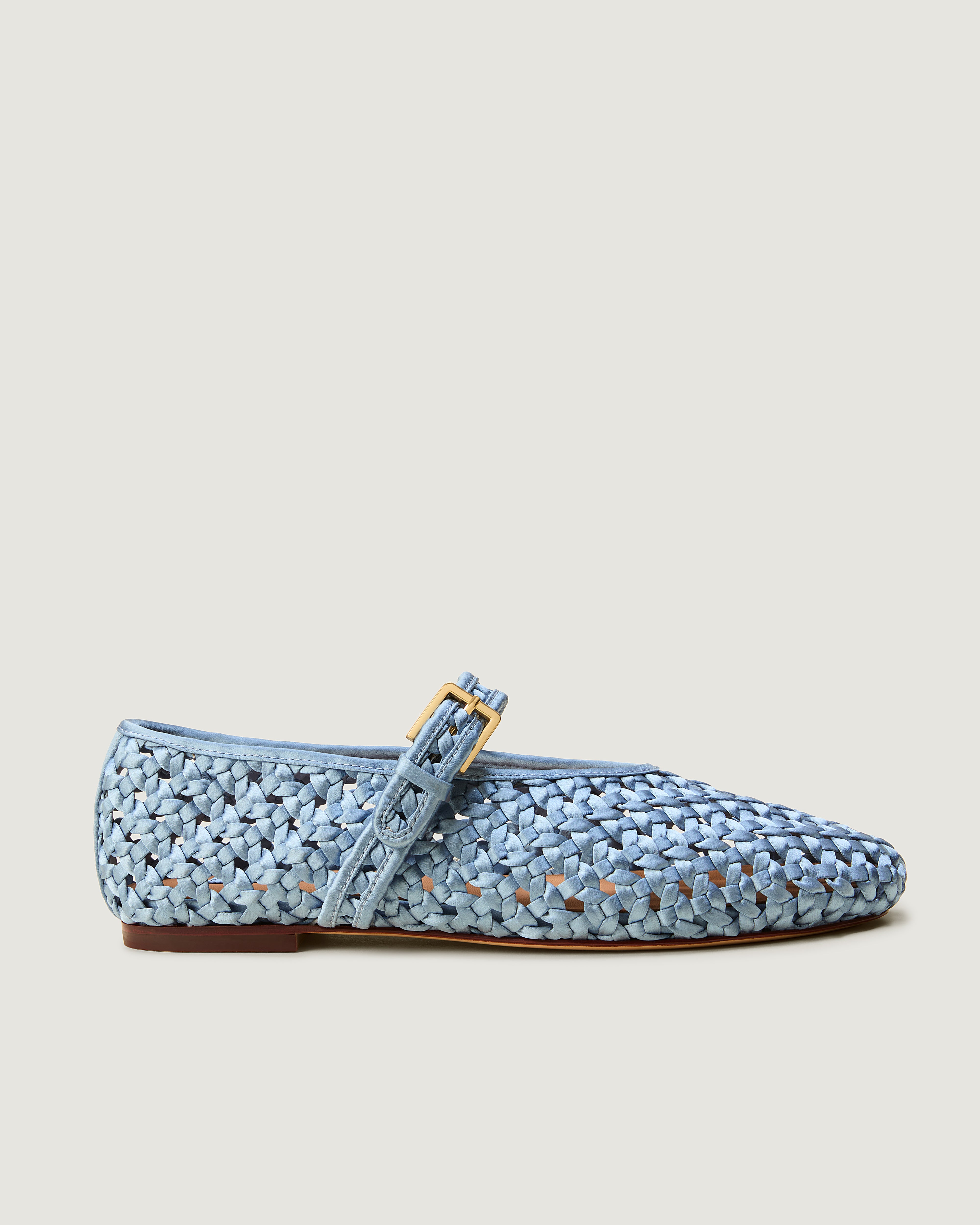 Side view of The Sydney Mary Jane in Celeste, a sky blue tone, featuring a closed toe and round silhouette, featuring an adjustable strap with buckle closure.