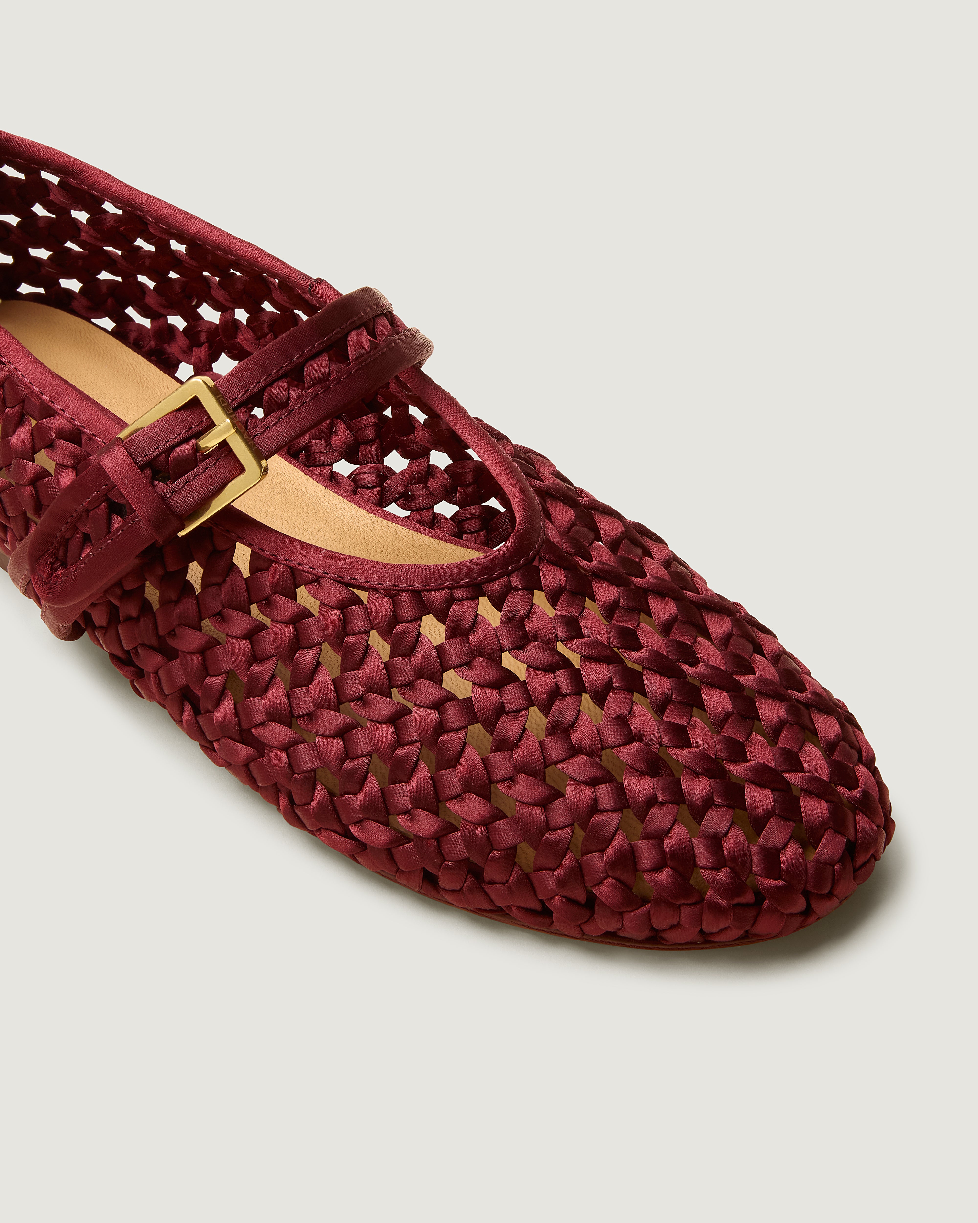 Close-up of The Sydney Mary Jane in Garnet showing its closed toe and round silhouette.
