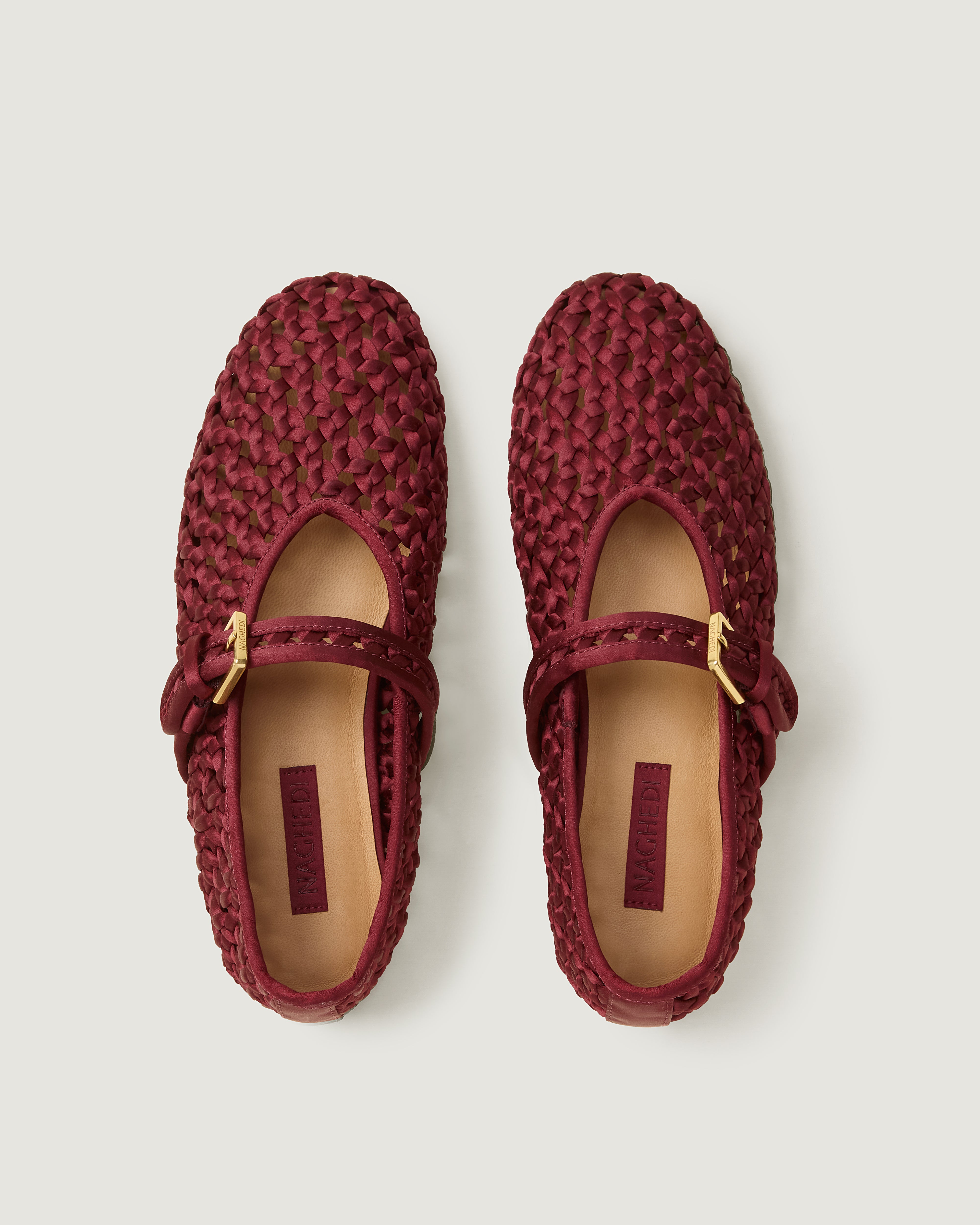 Top view of pair of The Sydney Mary Jane in Garnet showing the natural tanned leather insole.