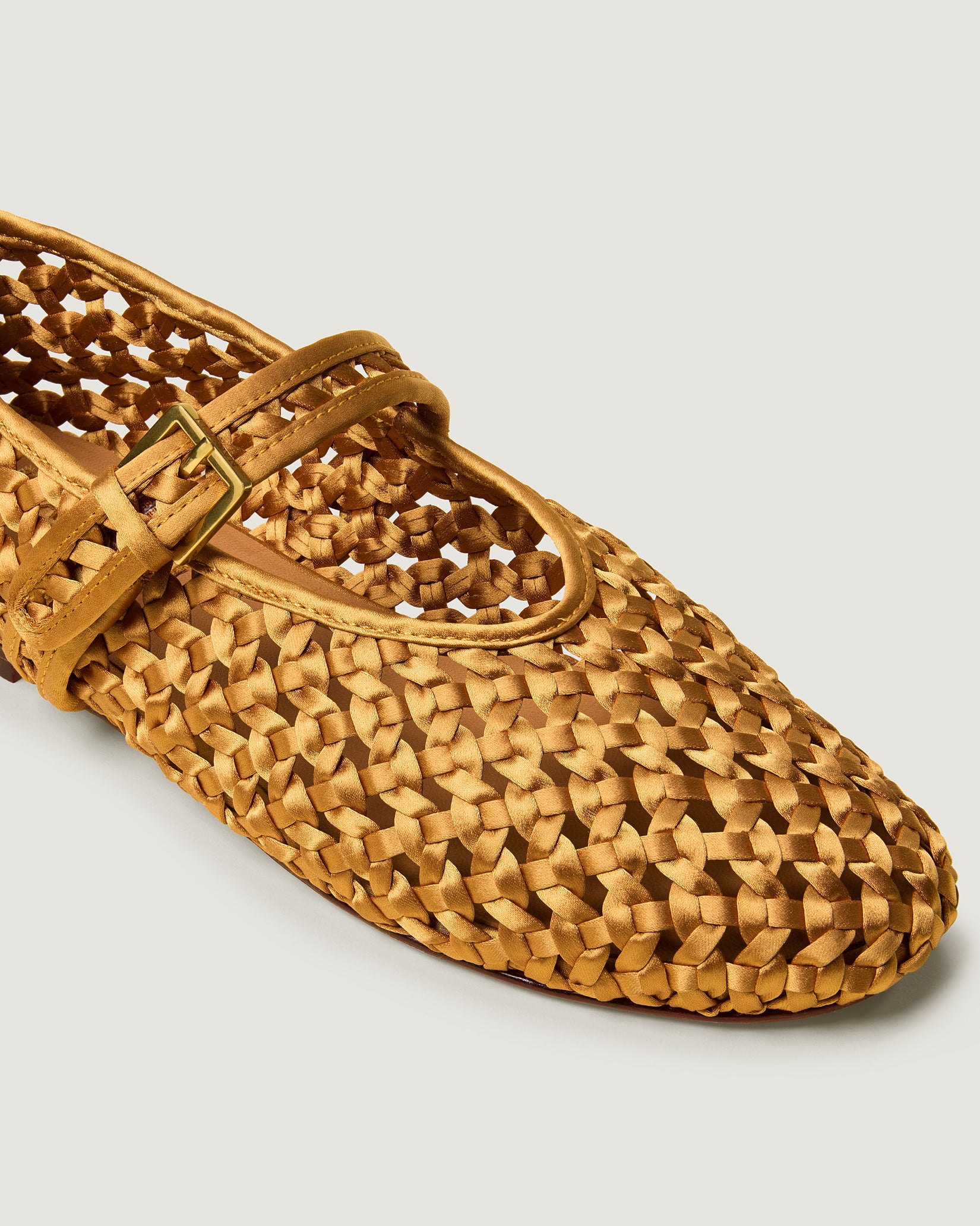 Close-up of Sydney Satin Mary Jane Flats in Ore showing its closed toe and round silhouette.