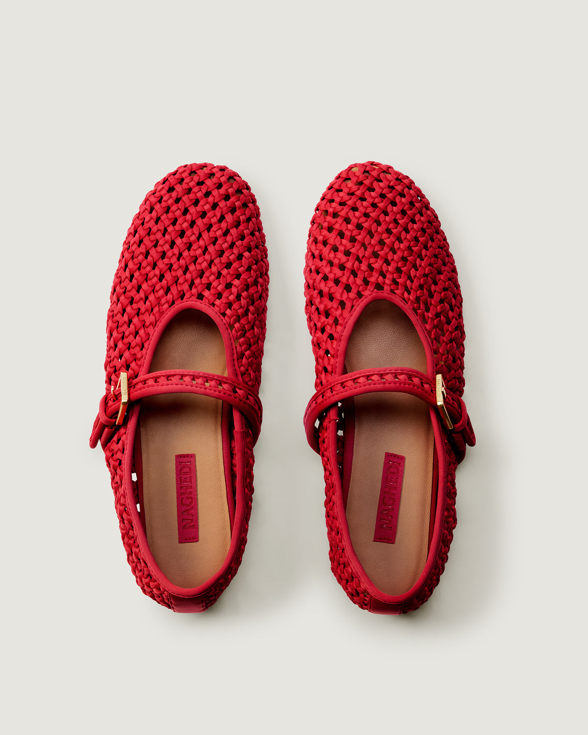 Top view of pair of The Sydney Mary Jane in Cerise showing the natural tanned leather insole.