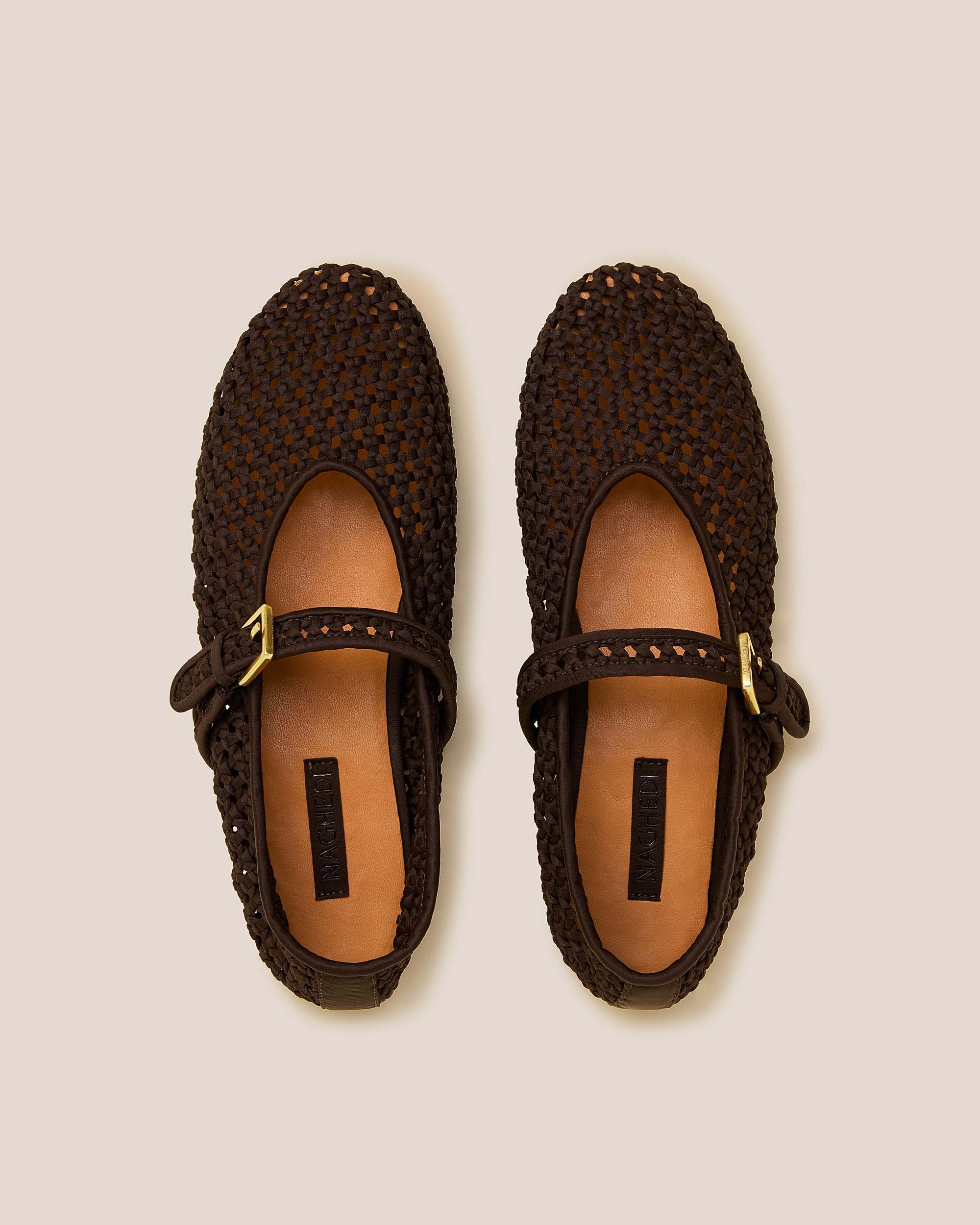 Top view of pair of Sydney Mary Jane Flats in Chocolate showing the natural tanned leather insole.