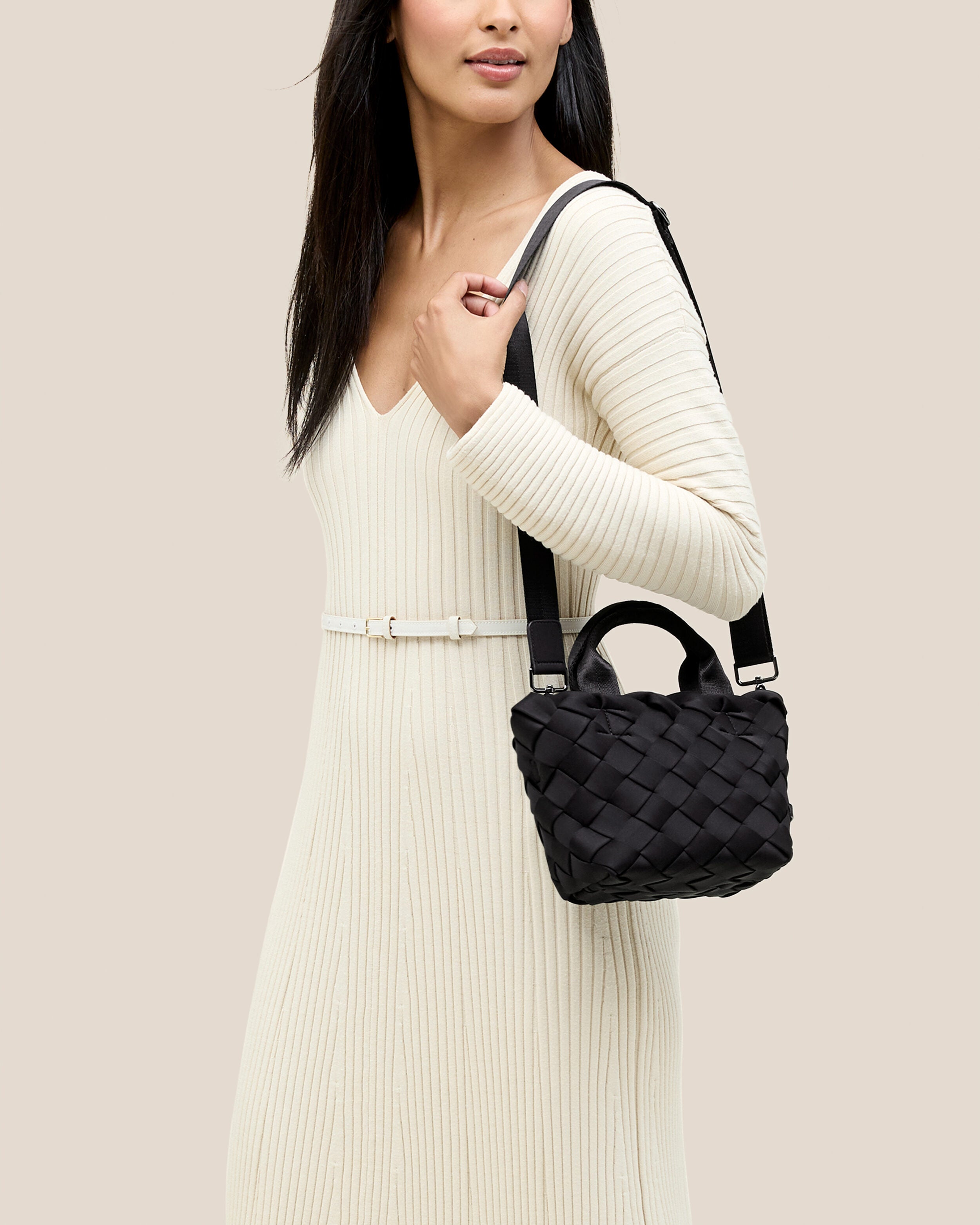 Tangier Tote in Onyx shown on model to illustrate scale and soft silhouette.