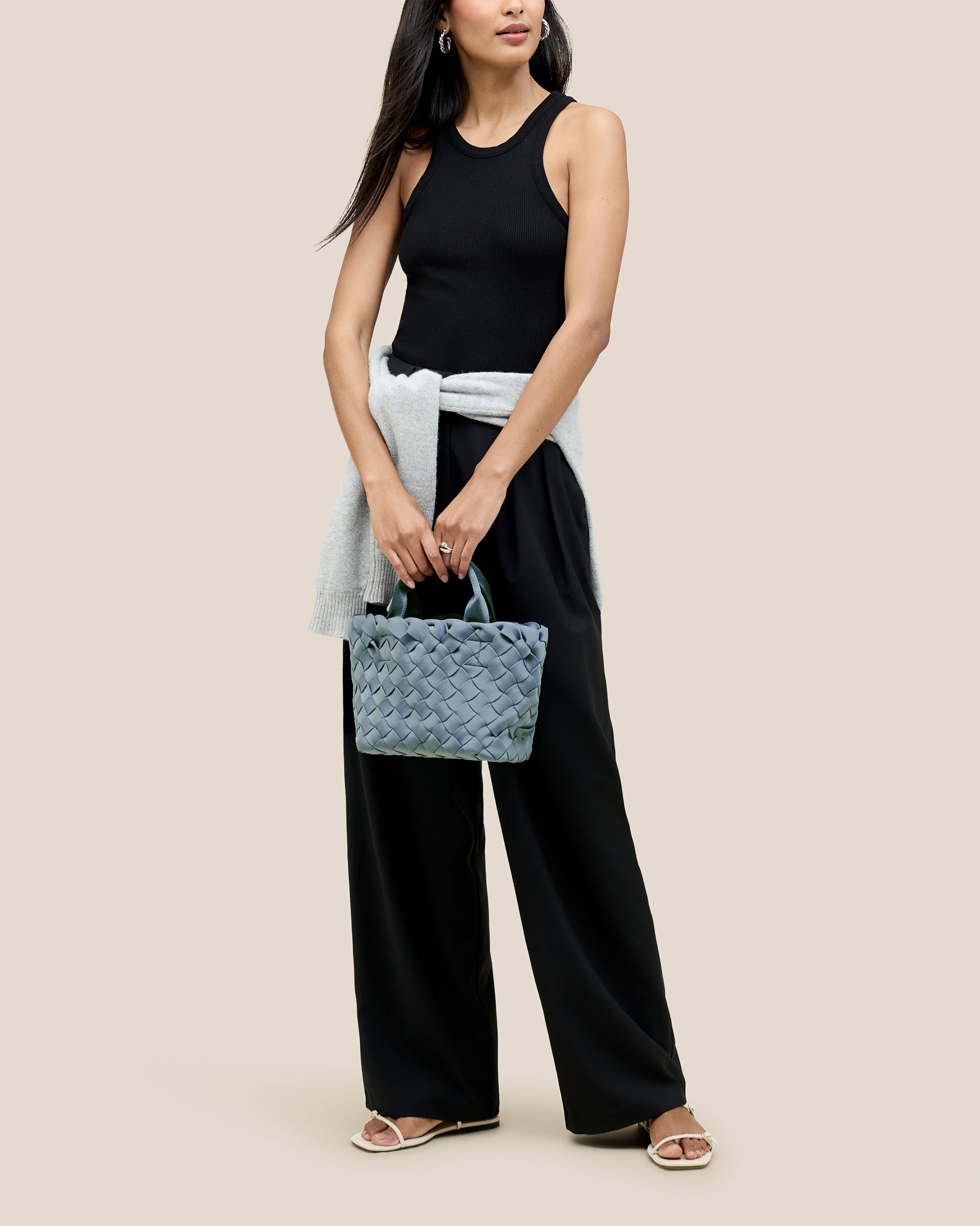 Tangier Tote in Nova shown on model to illustrate scale and soft silhouette.