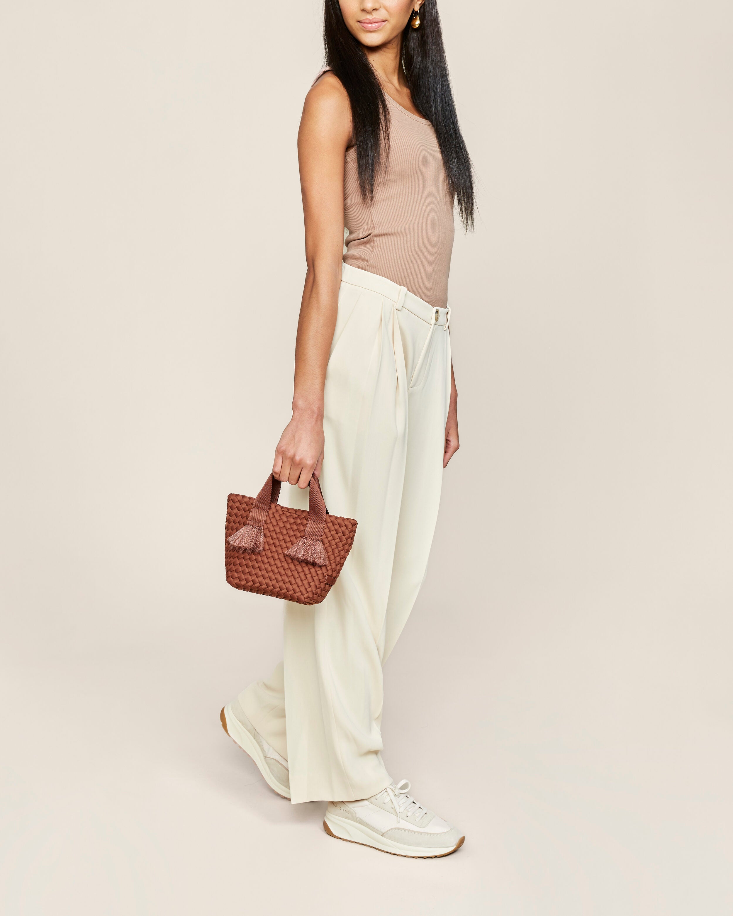 Tulum Tote in Adobe shown on model to illustrate scale and soft silhouette.