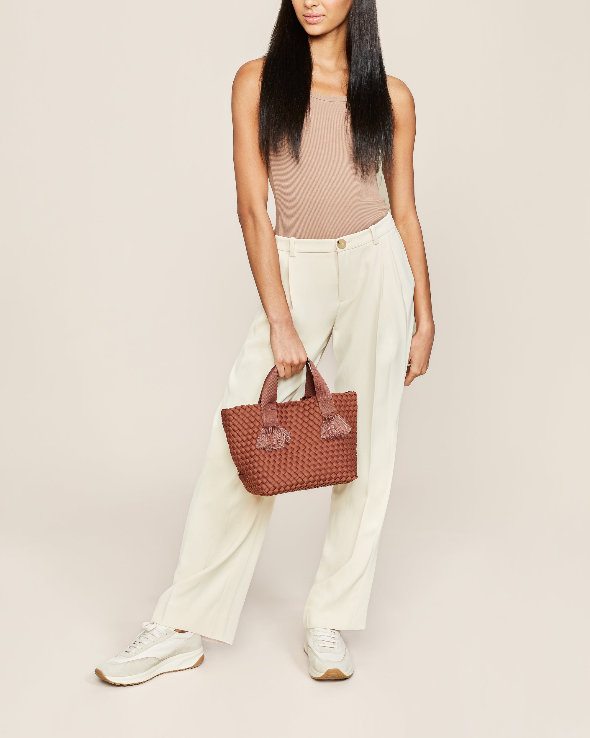 Tulum Tote in Adobe shown on model to illustrate scale and soft silhouette.