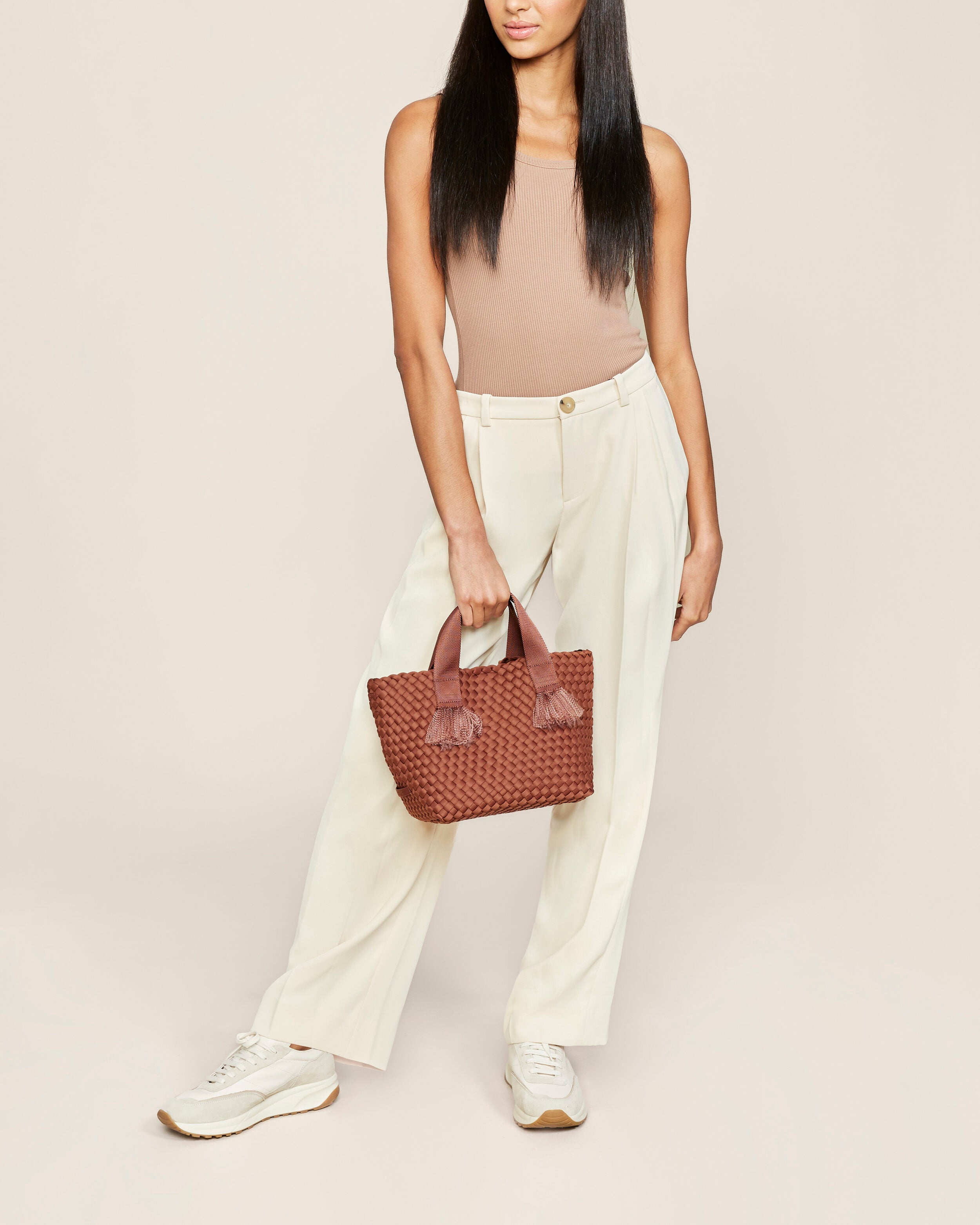 Tulum Tote in Adobe shown on model to illustrate scale and soft silhouette.