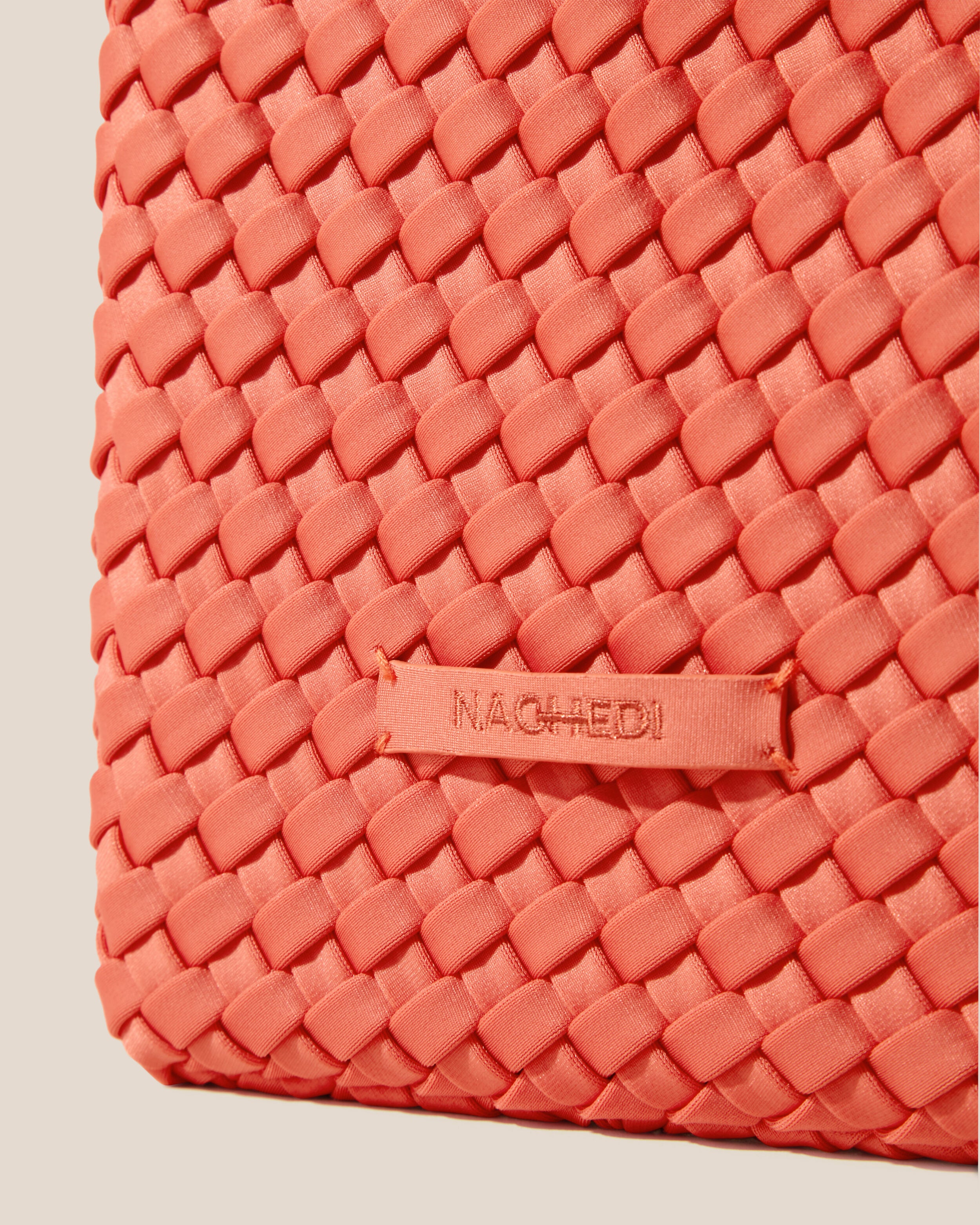 Close-up of stamped NAGHEDI logo on Tulum Tote in Bonaire.