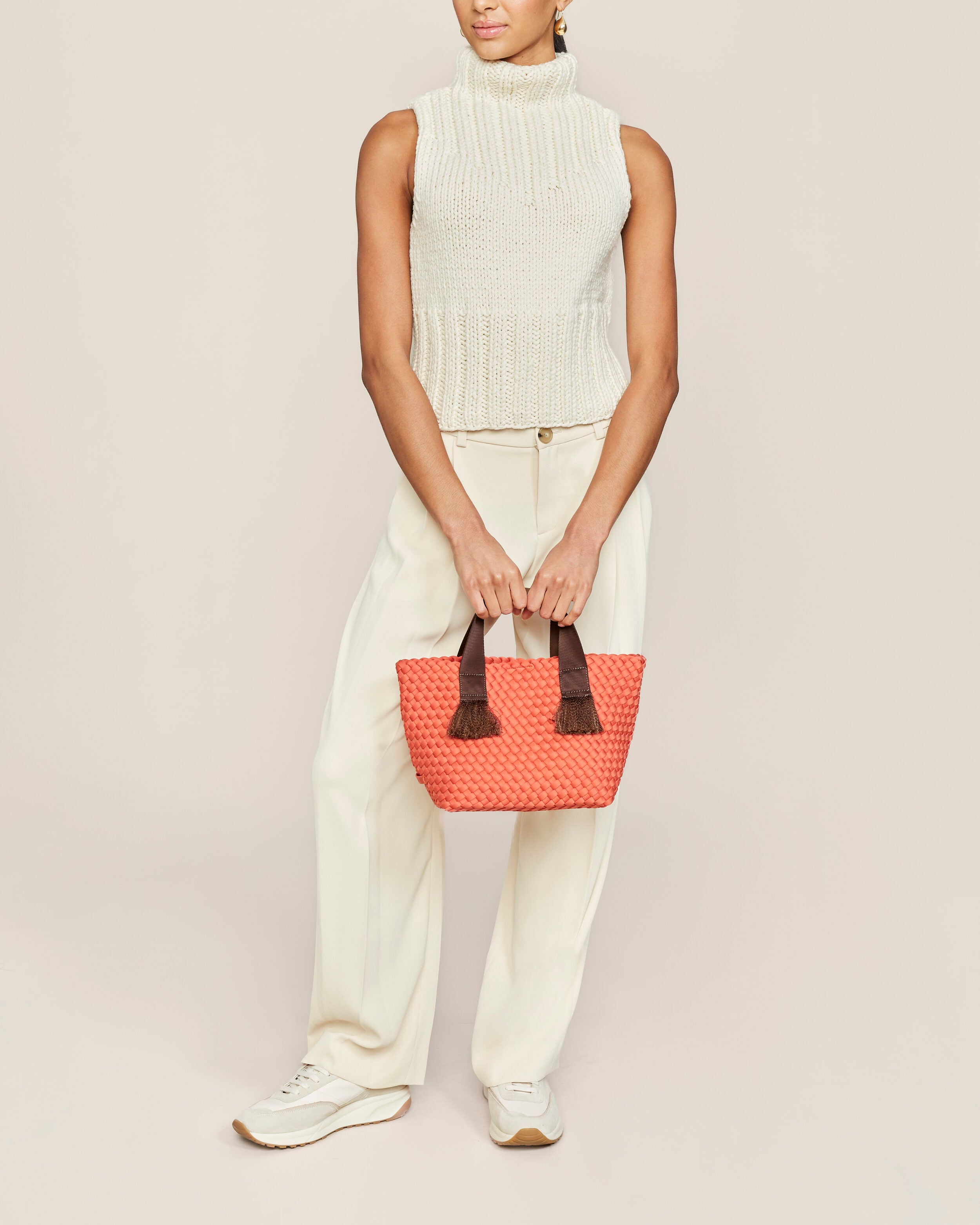Tulum Tote in Bonaire shown on model to illustrate scale and soft silhouette.