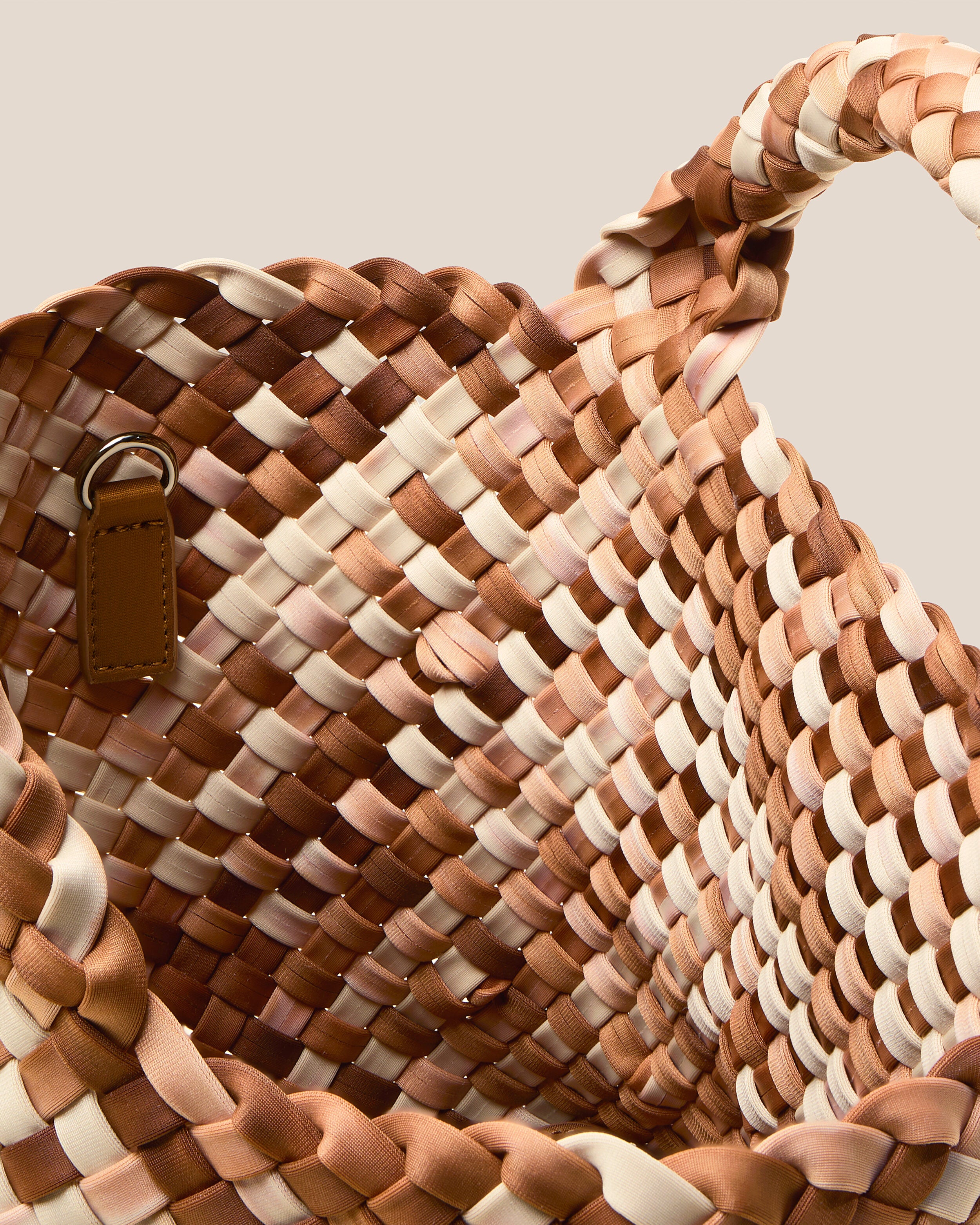 Interior close-up of St. Barths Tote in Fawn showing its open top, and unlined interior.