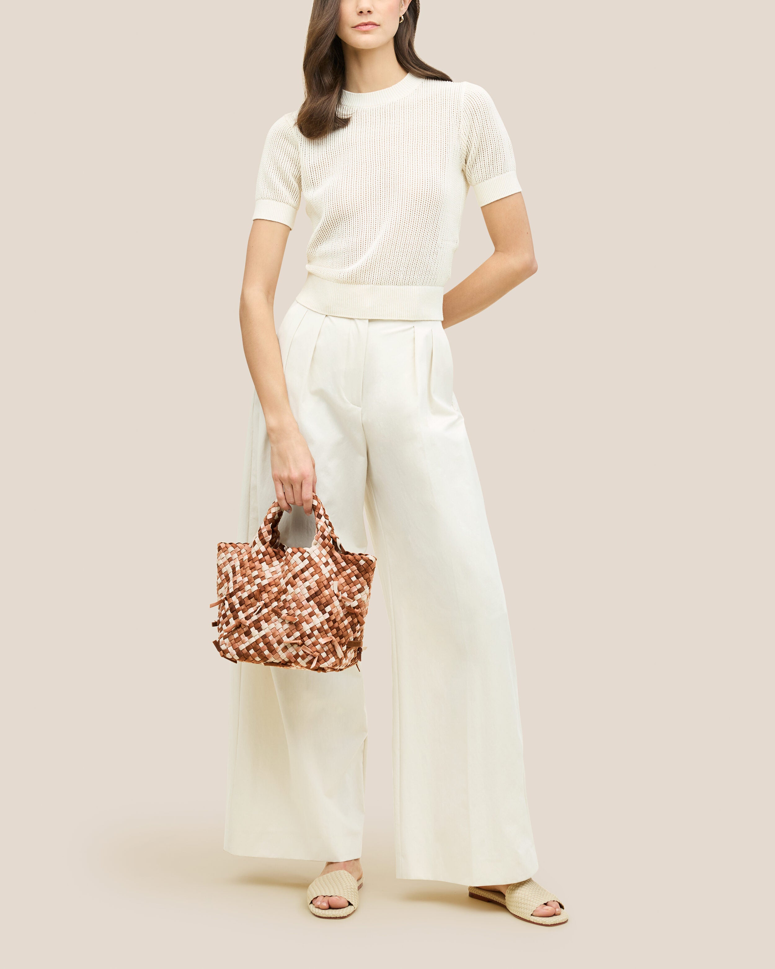 St. Barths Tote in Fawn shown on model to illustrate scale and soft silhouette.